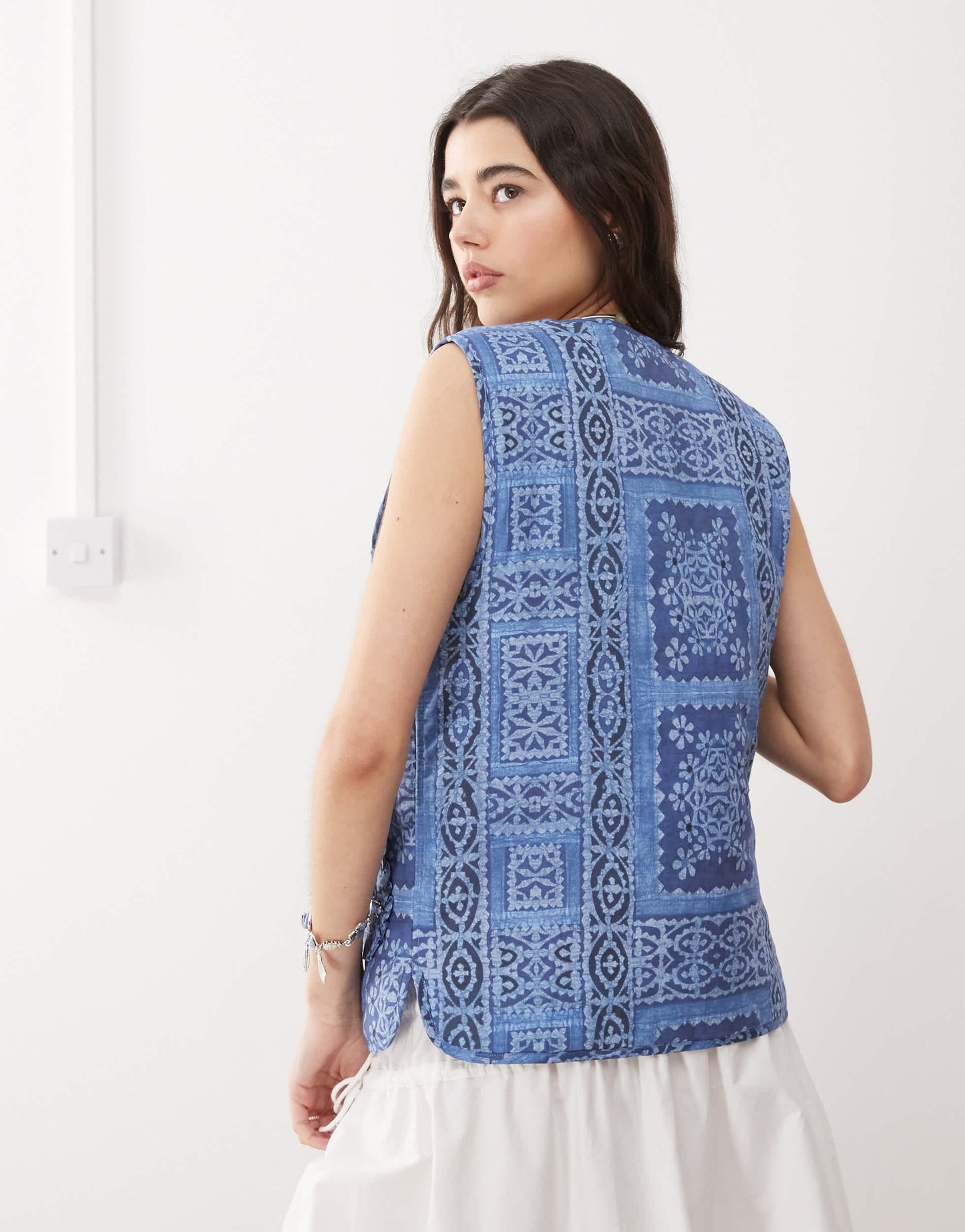 Reclaimed Vintage printed tie front quilted reversible gilet in powder blue print