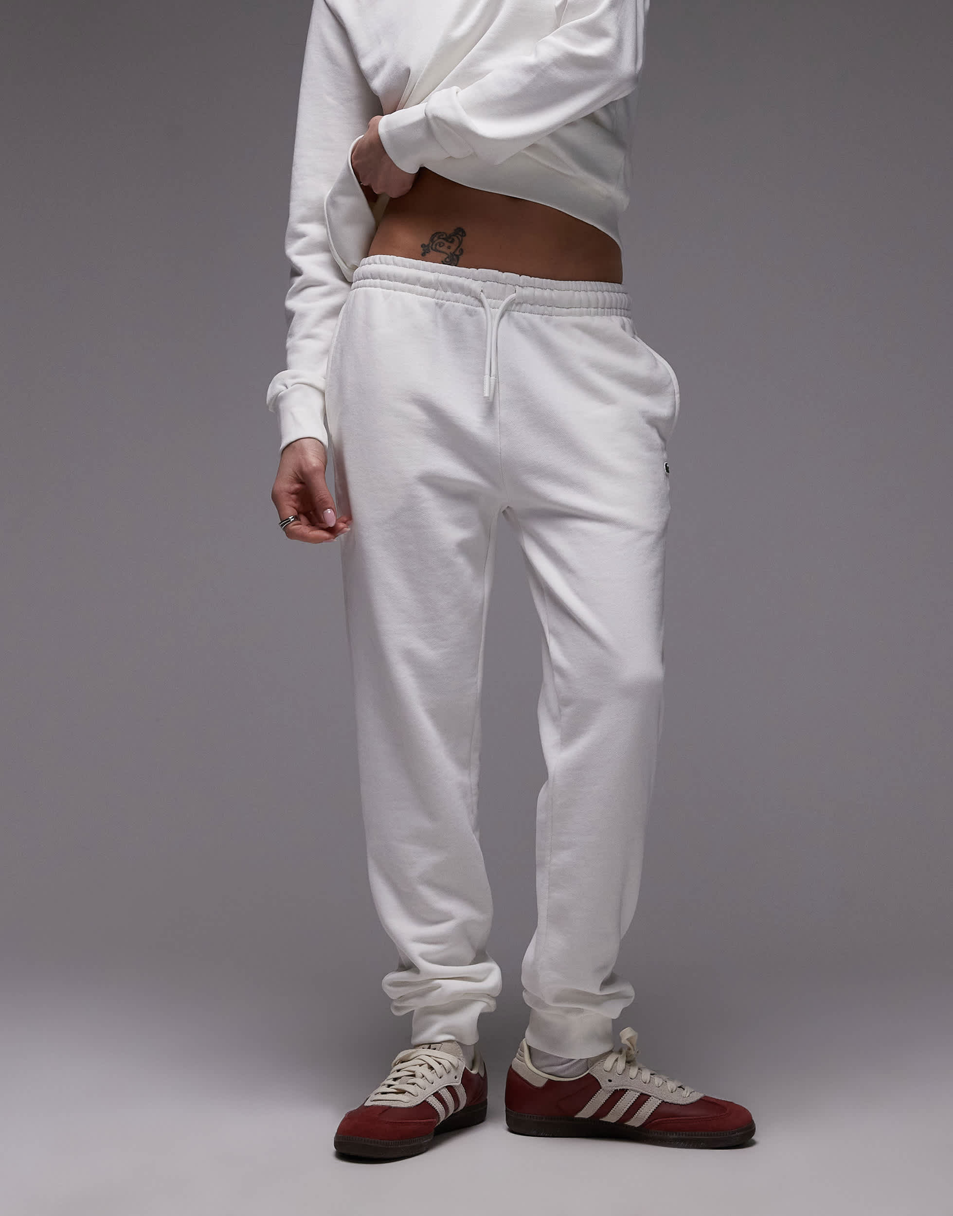 Lacoste cuffed joggers in white