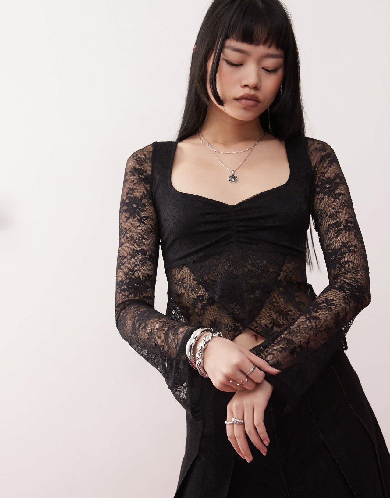 Motel mandira long sleeve lace wrap over top in black