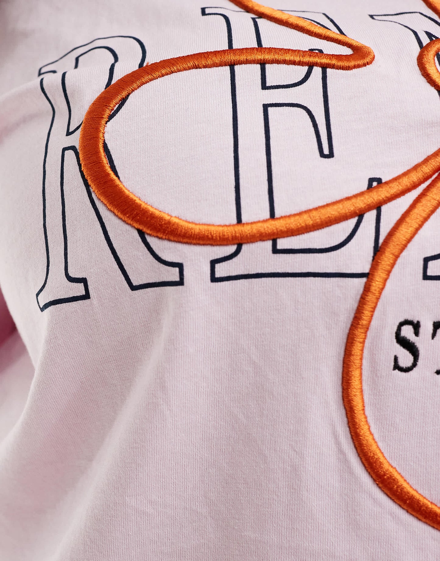 Renee Studio Plus exclusive crew neck embroidered flower logo t-shirt in pink