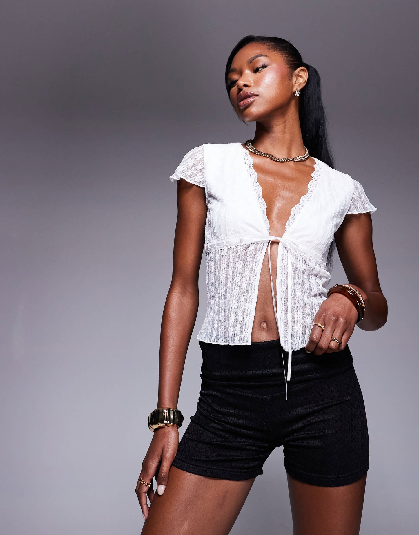 Princess Polly fold over lace mini shorts in black