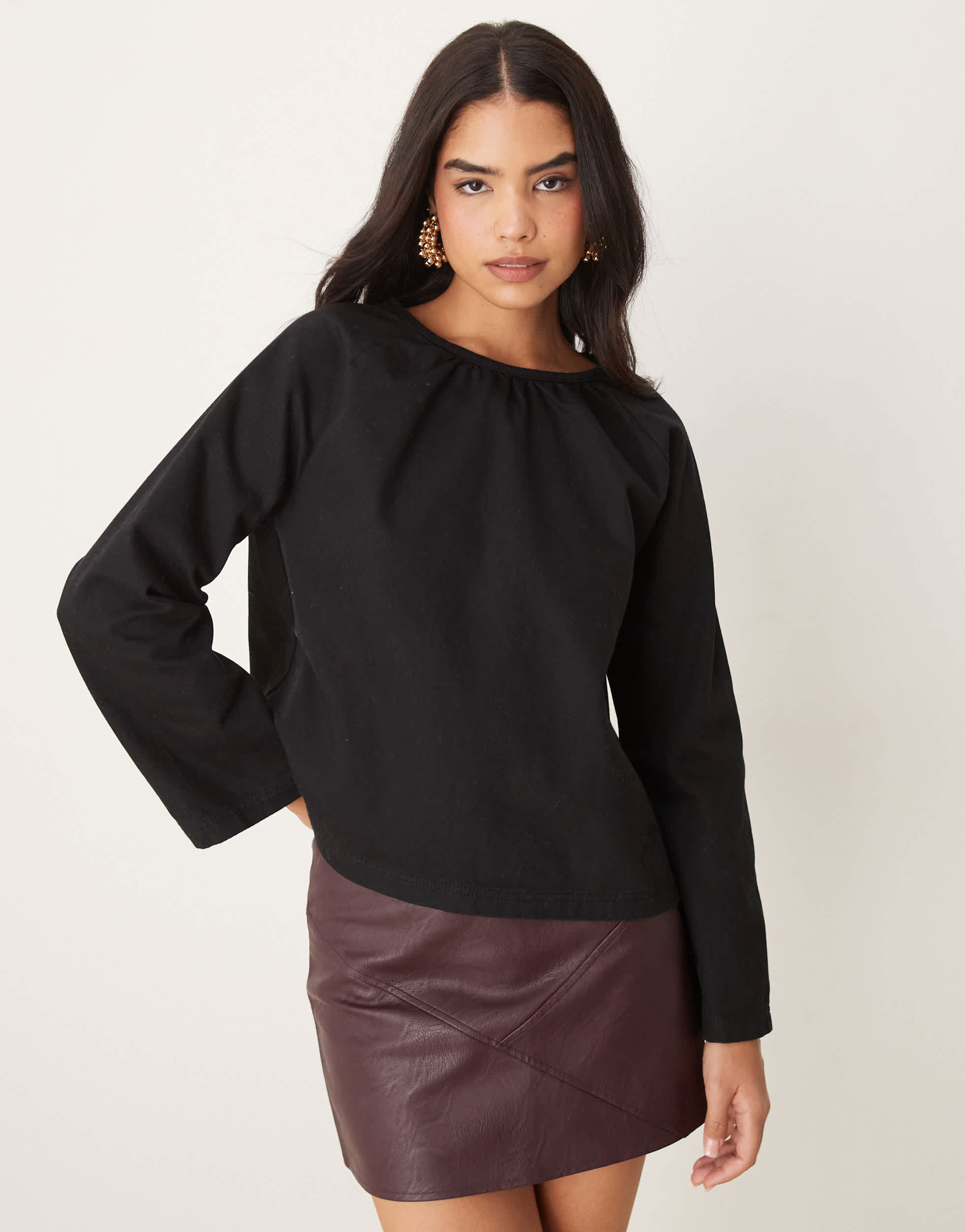 ASOS DESIGN denim raglan long sleeve top in black