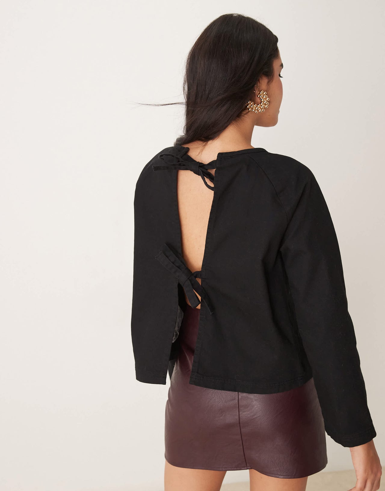 ASOS DESIGN denim raglan long sleeve top in black