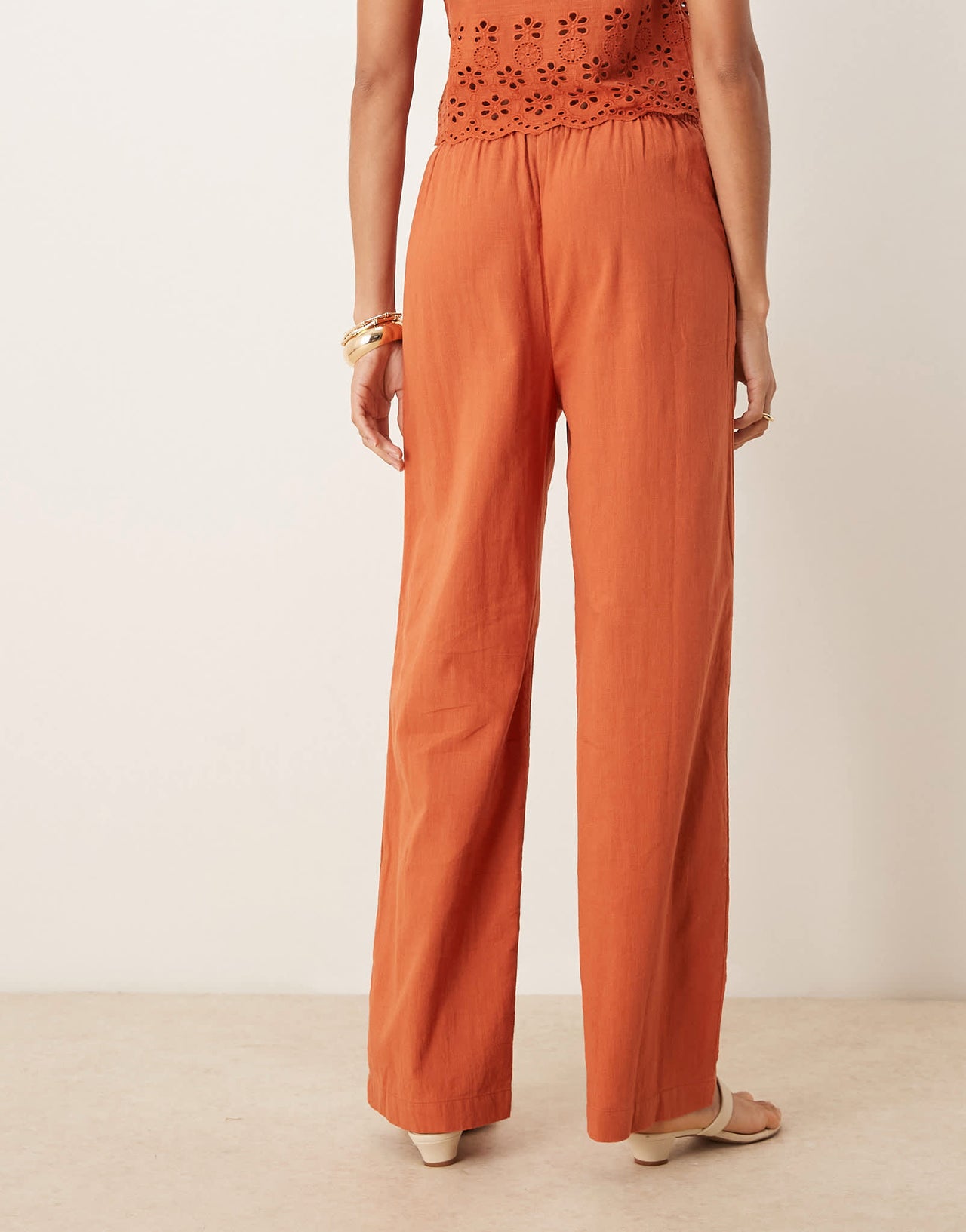 Iisla & Bird ruffle front beach trouser co-ord in rust