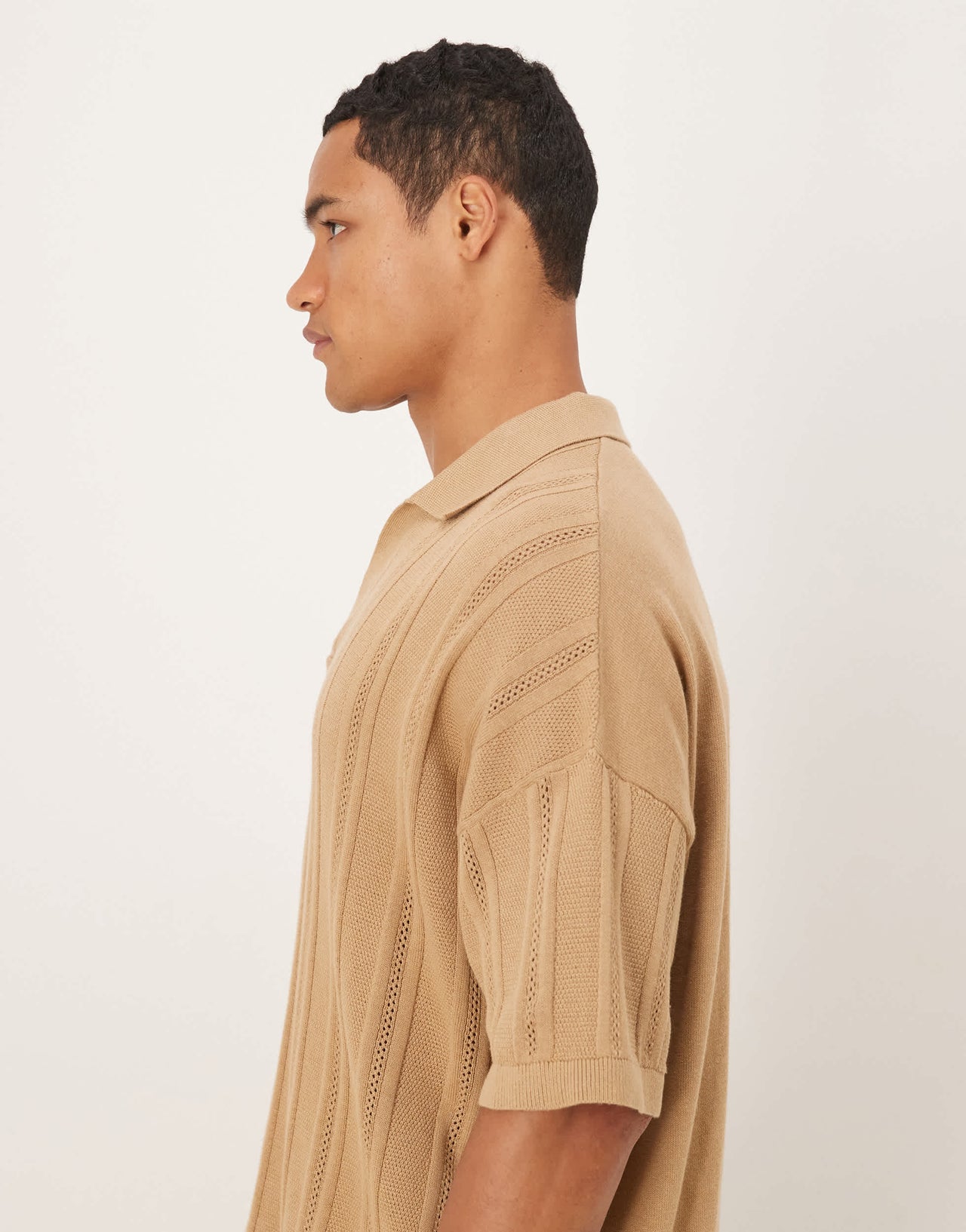 ASOS DESIGN oversized knitted rib notch neck polo in beige
