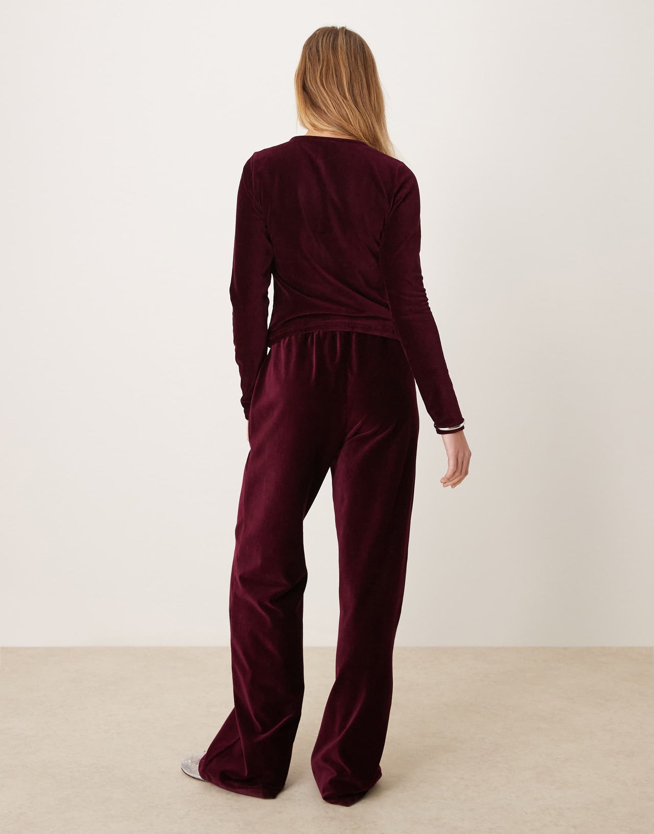 ASOS DESIGN wide leg velvet cord trousers in burgundy