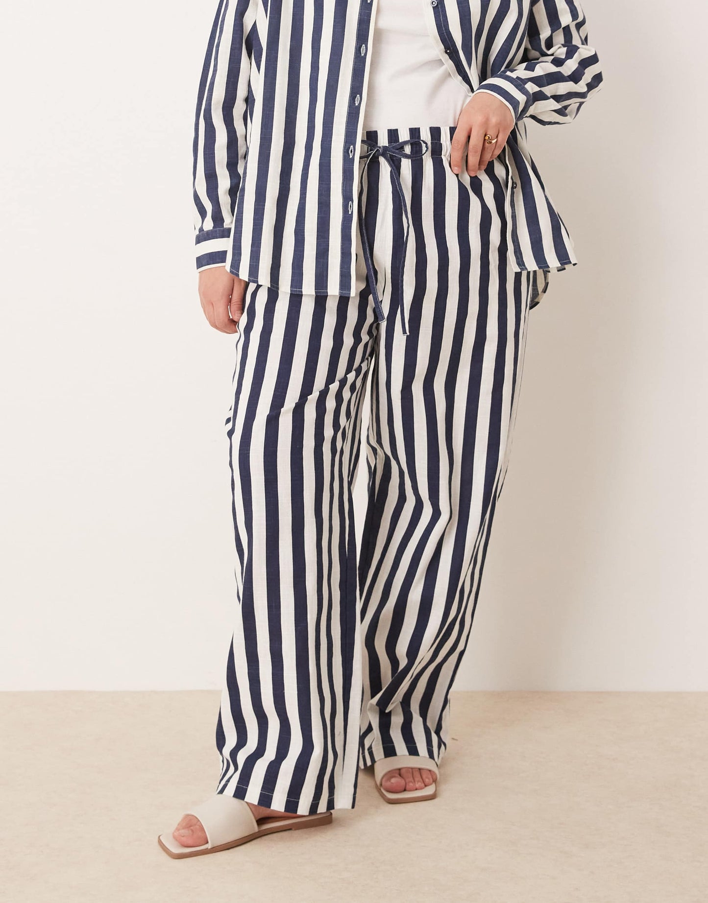 ASOS DESIGN Curve linen look pull on trousers in navy stripe co-ord