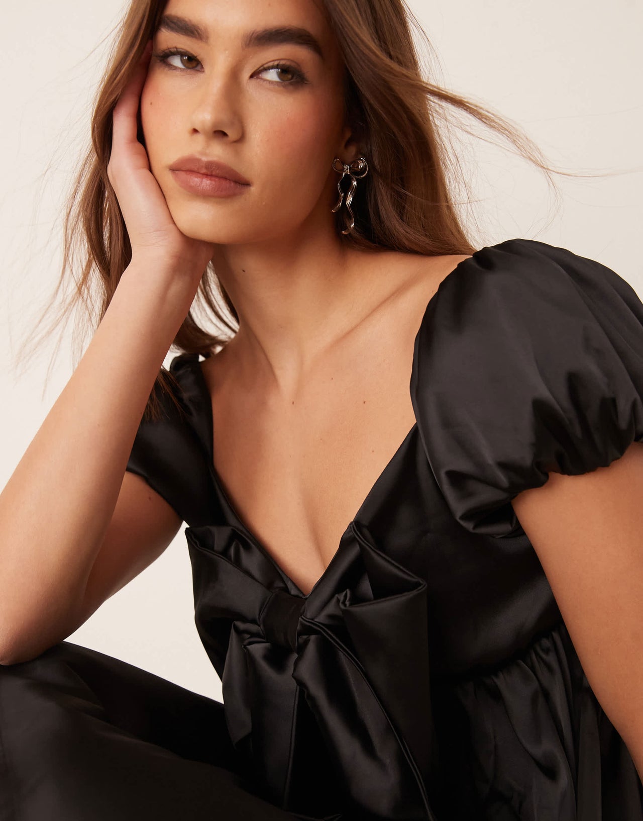 ASOS DESIGN satin oversized bow baby doll dress in black