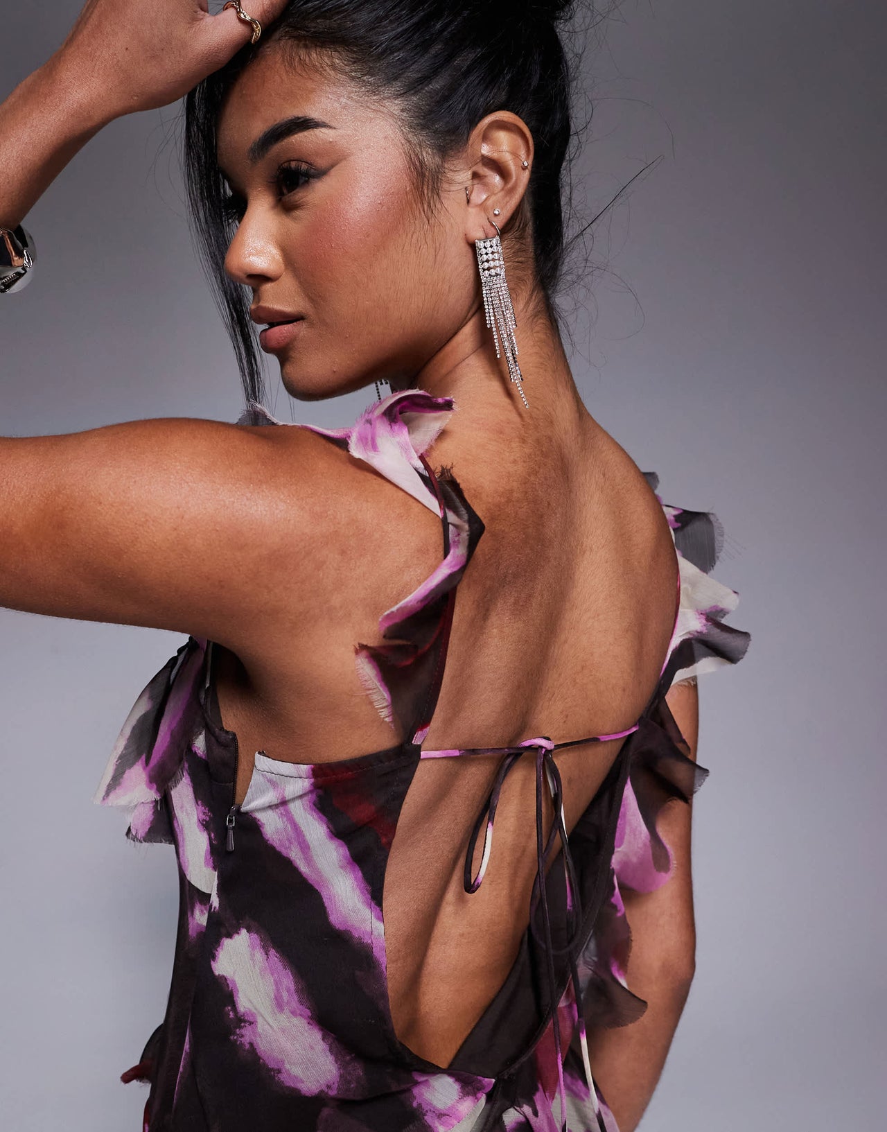 ASOS DESIGN raw edge frill mini dress with tie back in abstract print