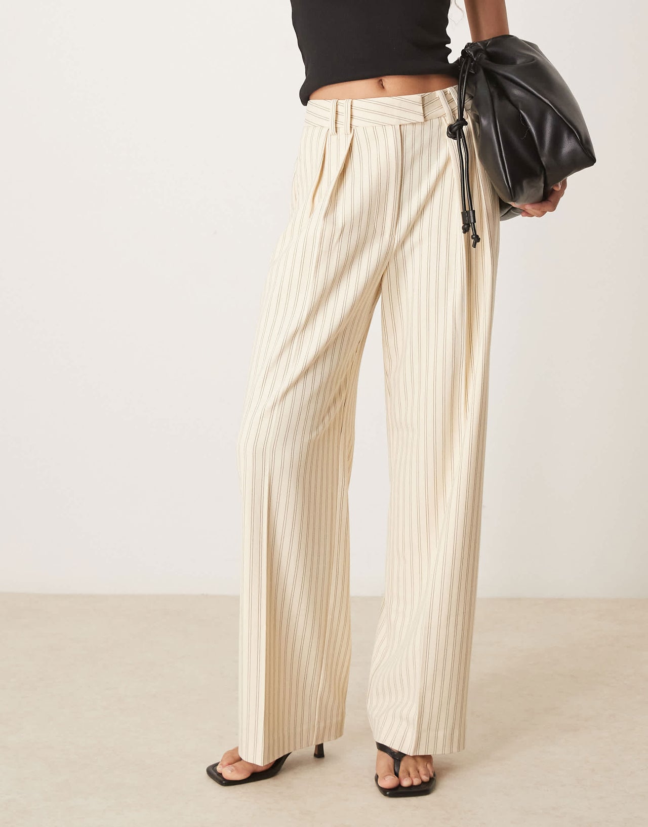 ASOS DESIGN tailored wide leg trousers with pleat detail in buttermilk stripe