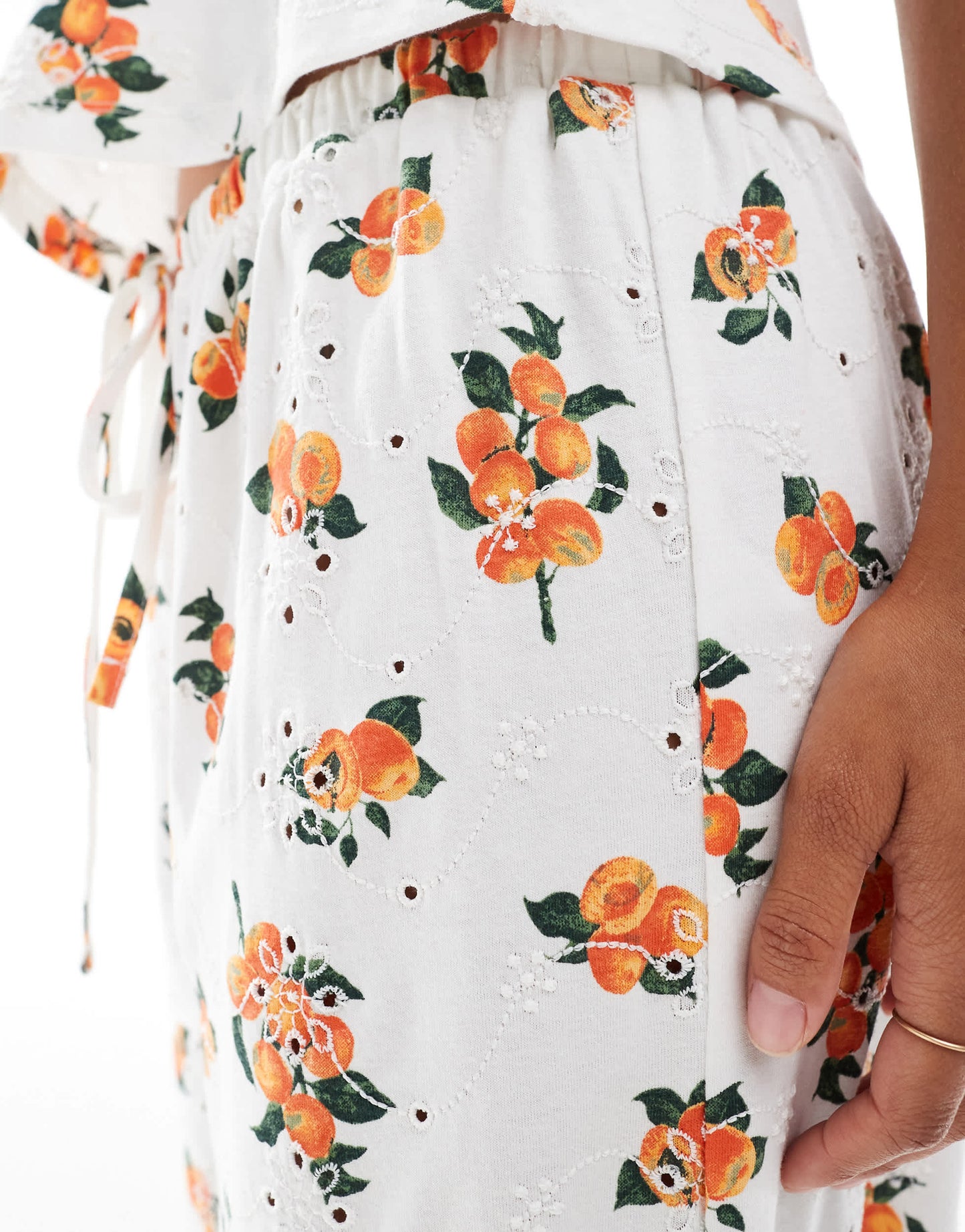 ASOS DESIGN broderie pyjama style trouser co-ord with tie waist in white orange print