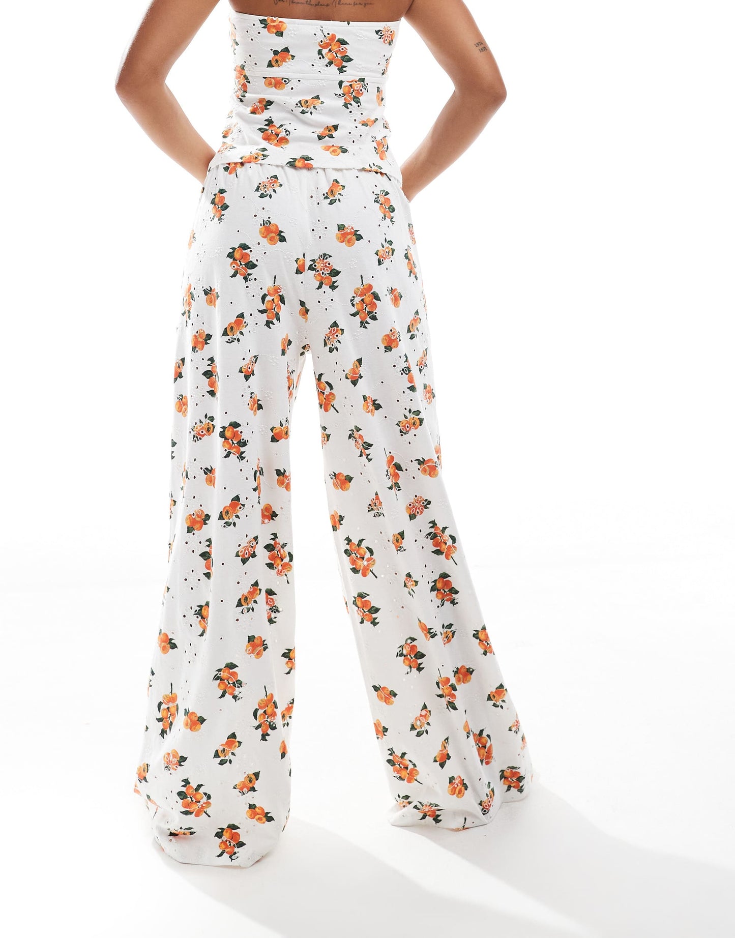 ASOS DESIGN broderie pyjama style trouser co-ord with tie waist in white orange print