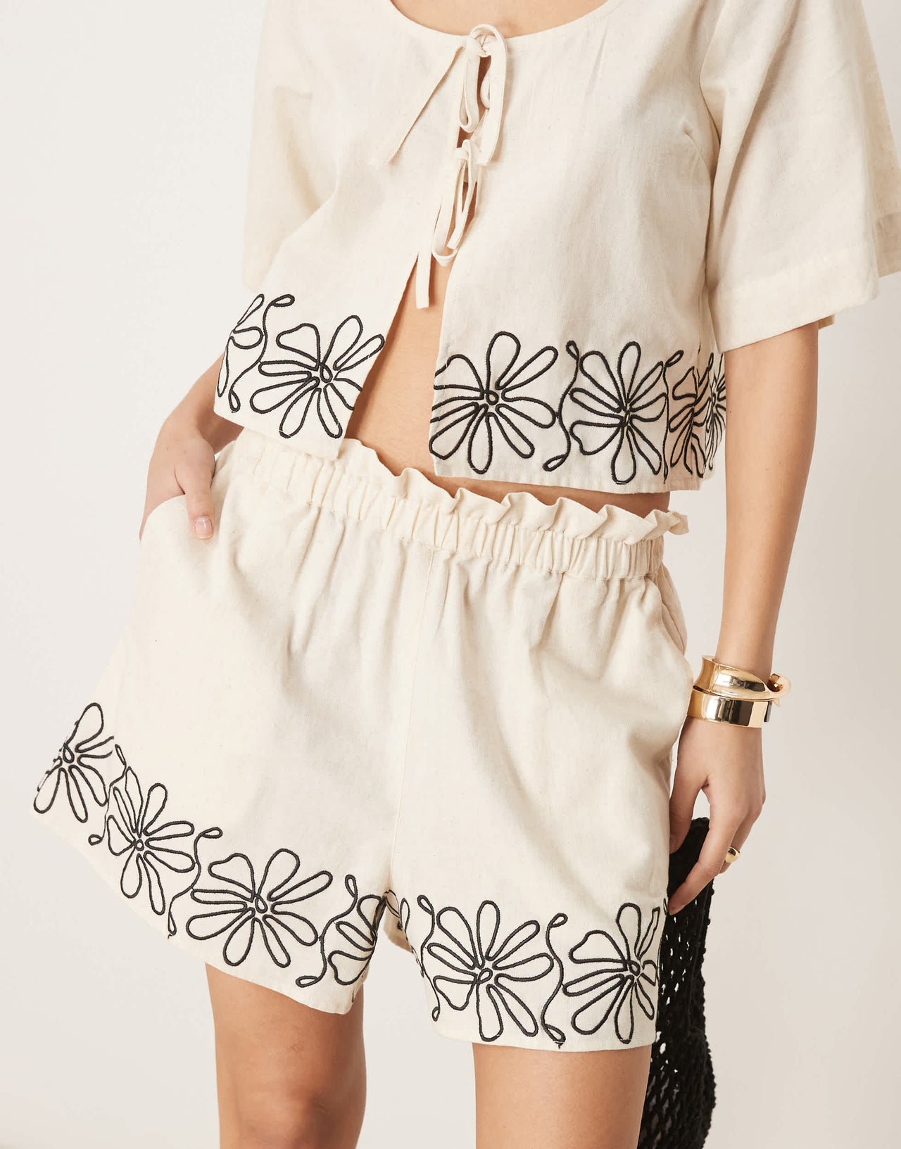 ASOS DESIGN paperbag waist embroidered hem shorts co-ord in stone