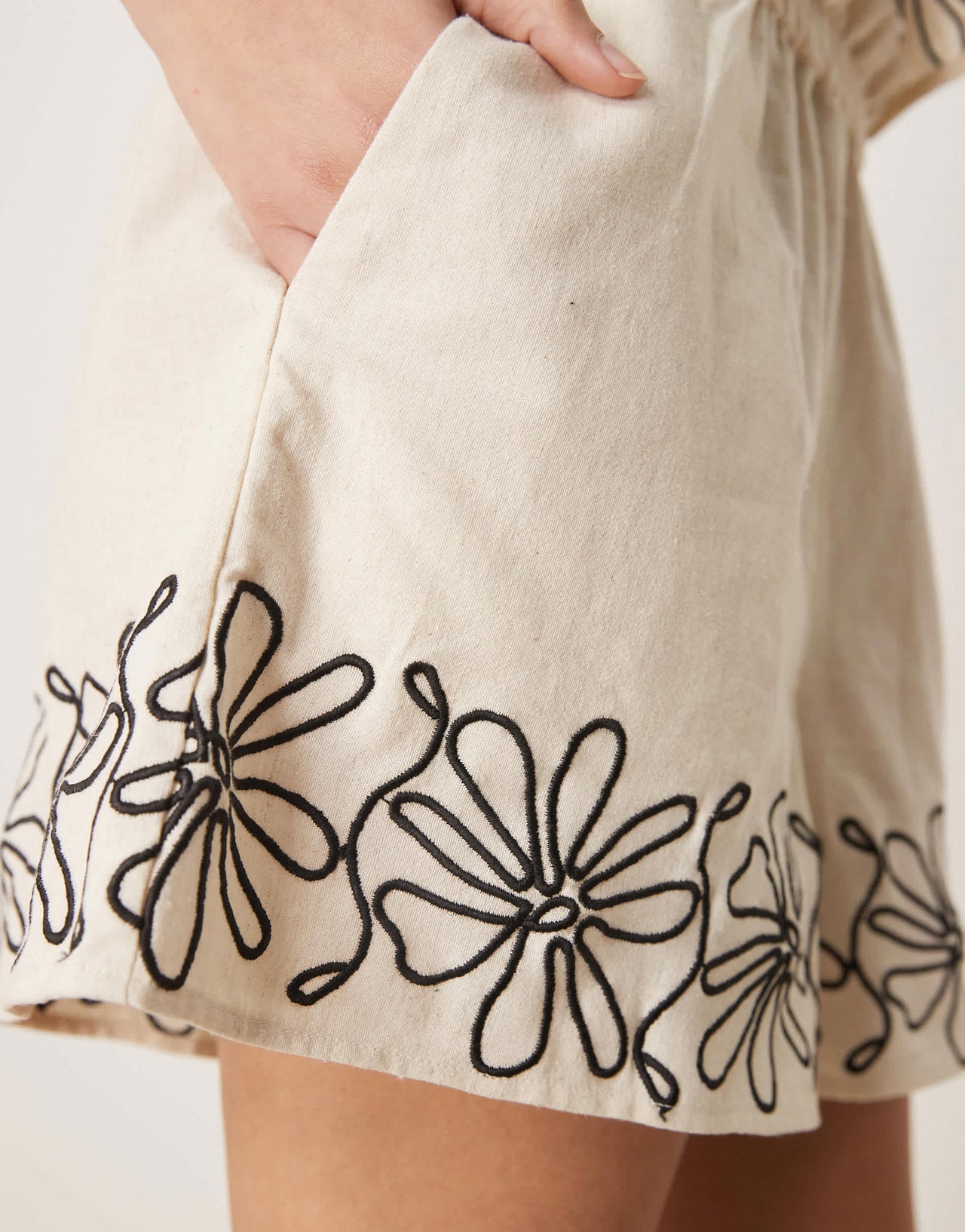 ASOS DESIGN paperbag waist embroidered hem shorts co-ord in stone