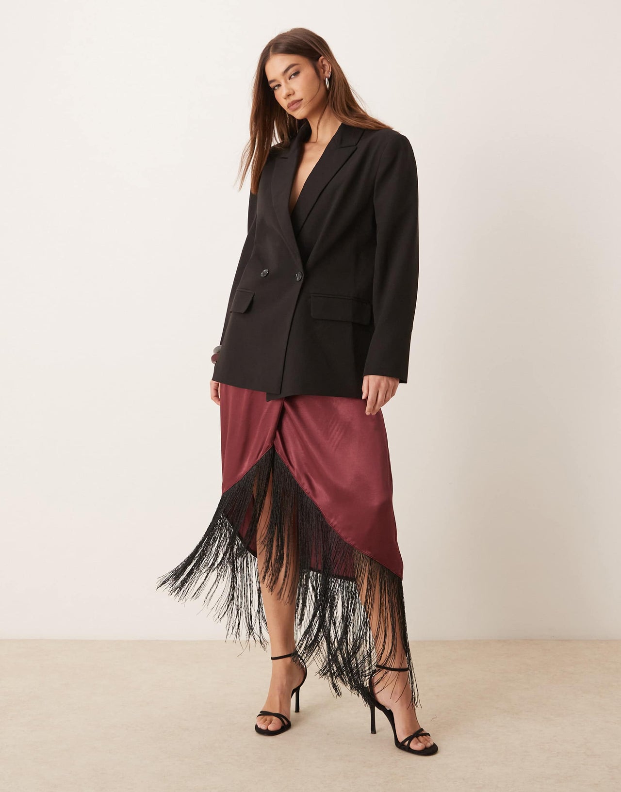 ASOS DESIGN satin wrap skirt with fringe hem in burgundy