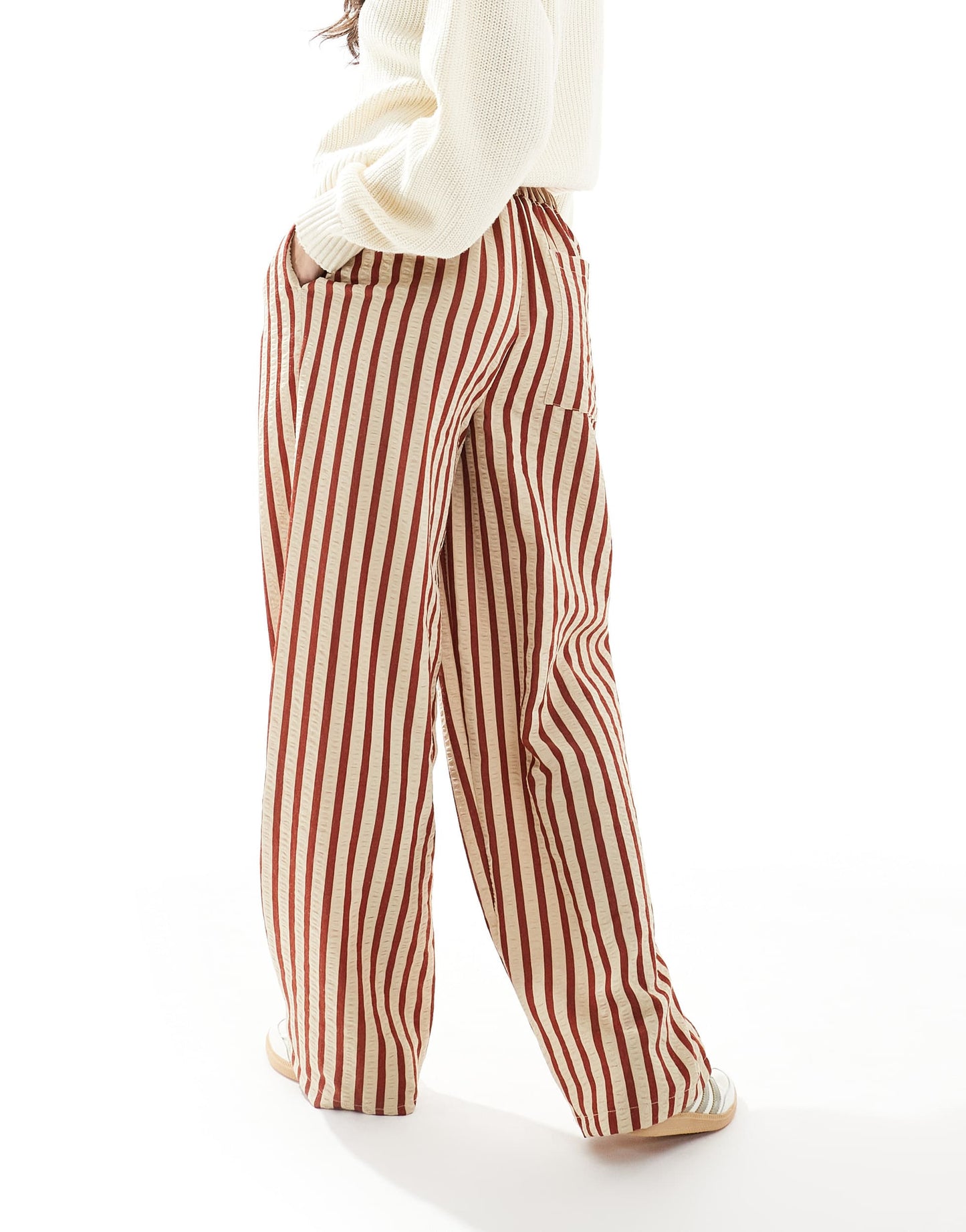 ASOS DESIGN straight leg seersucker trousers in rust stripe
