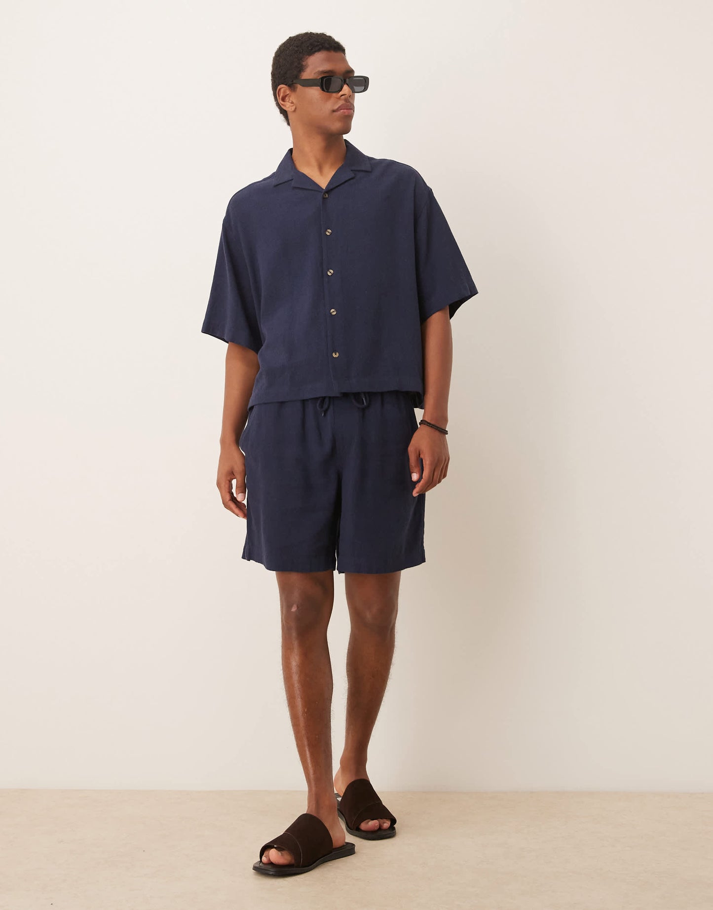 ASOS DESIGN co-ord baggy fit pull on shorts in navy linen rich