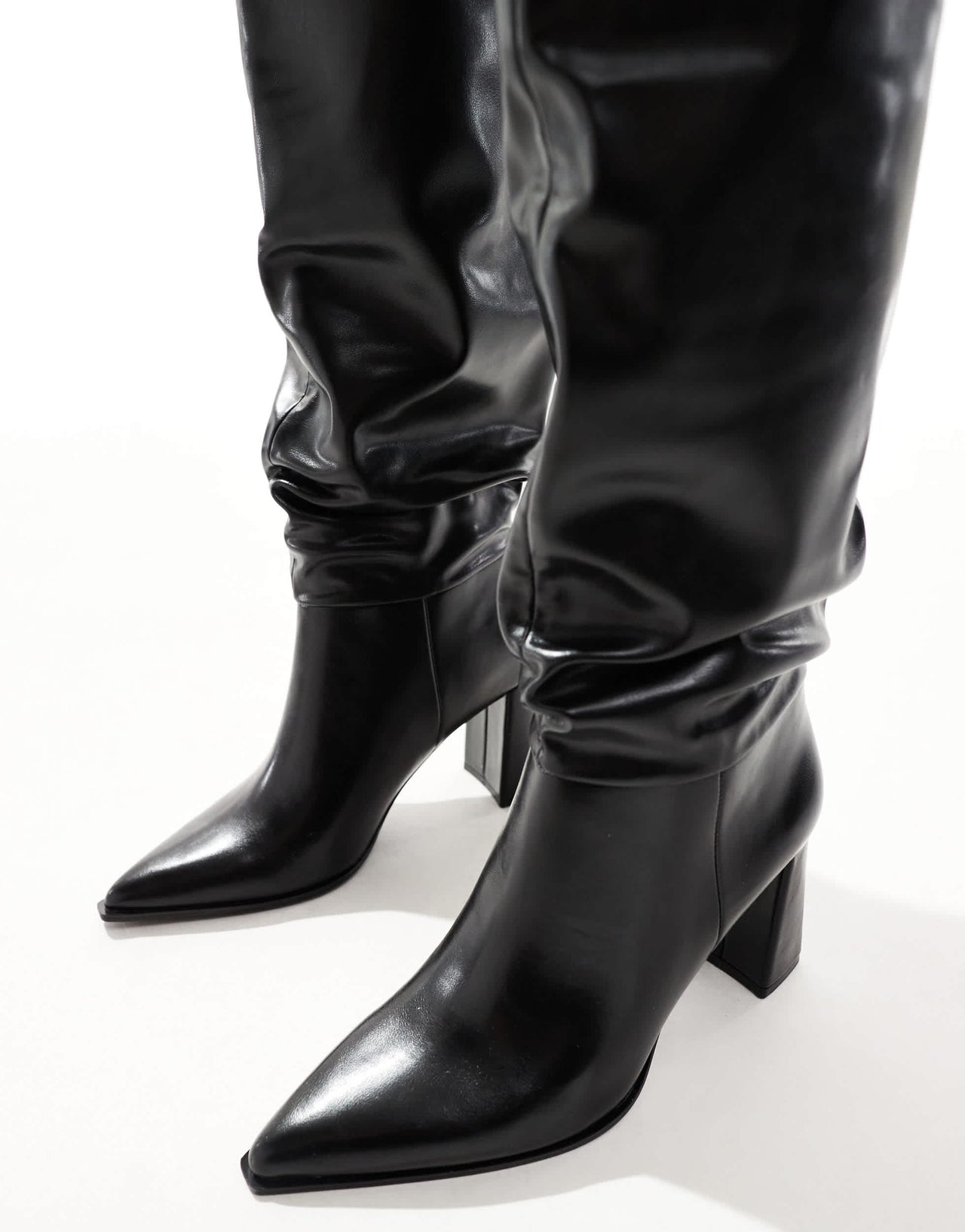 Stradivarius slouchy heeled knee high boot in black