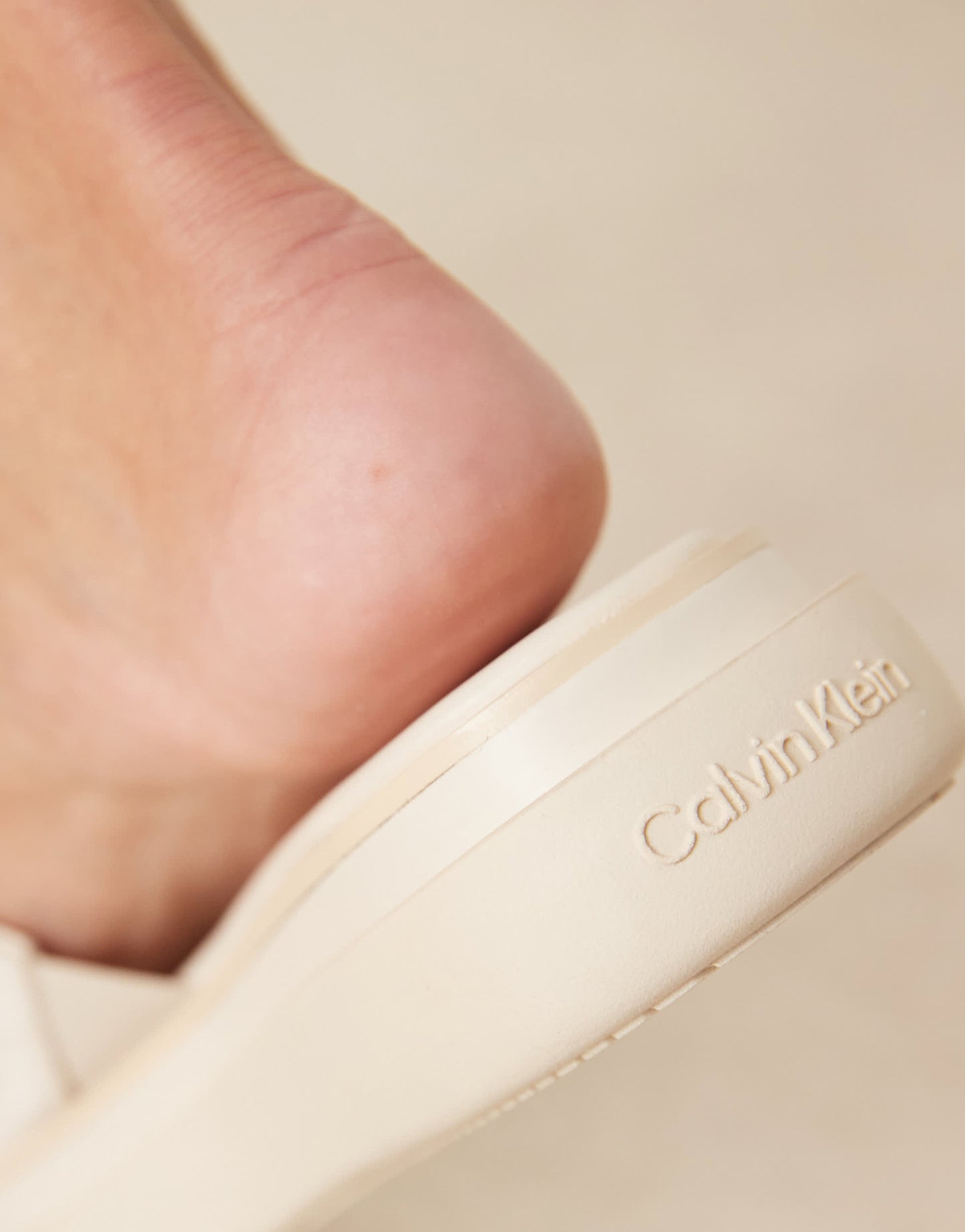 Calvin Klein flatform sliders in off white