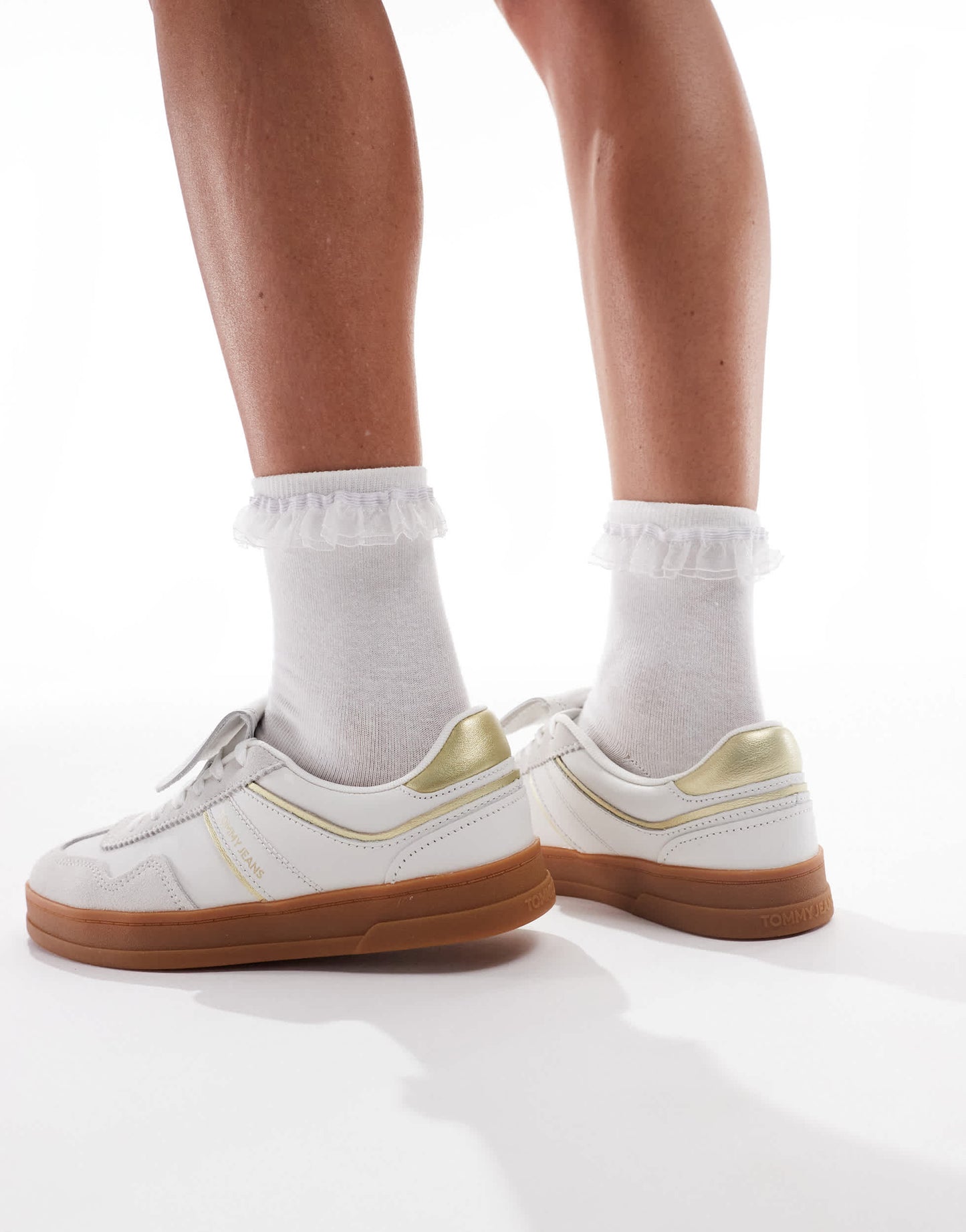 Tommy Jeans Greenwich trainers with gum sole in white and gold
