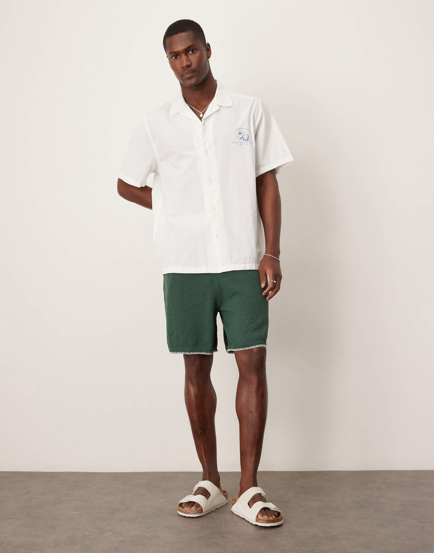ASOS DESIGN oversized knitted shorts with blanket stitch in dark green