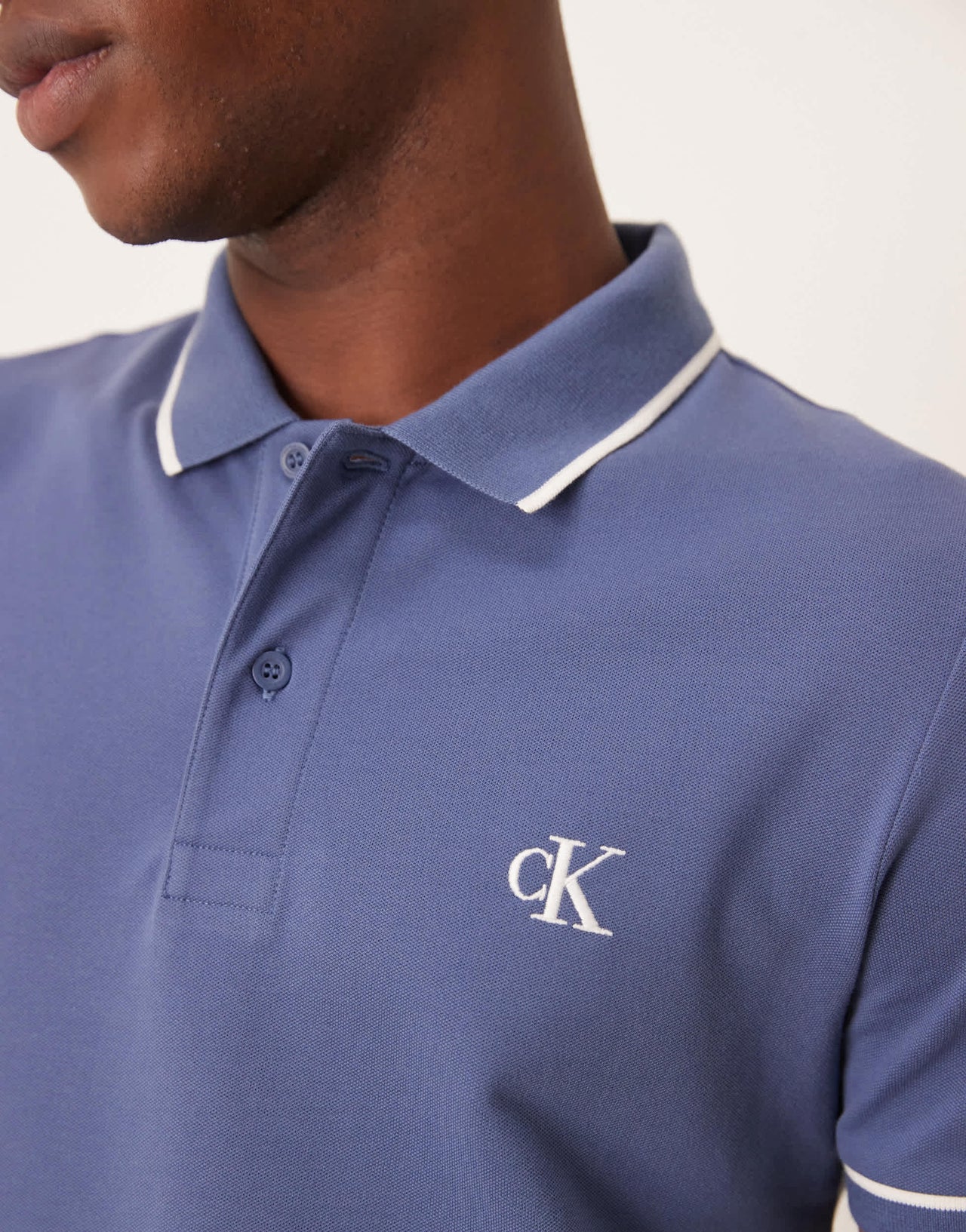 Calvin Klein Jeans tipped polo in washed blue