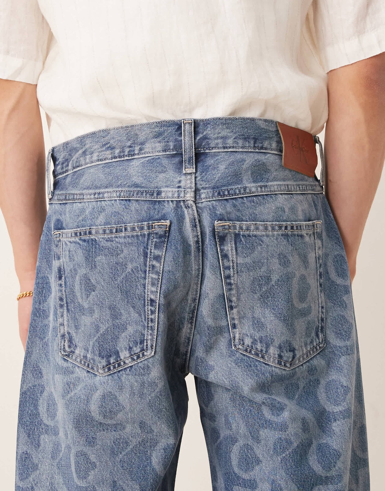 Calvin Klein Jeans 90s straight all over print jeans in mid wash