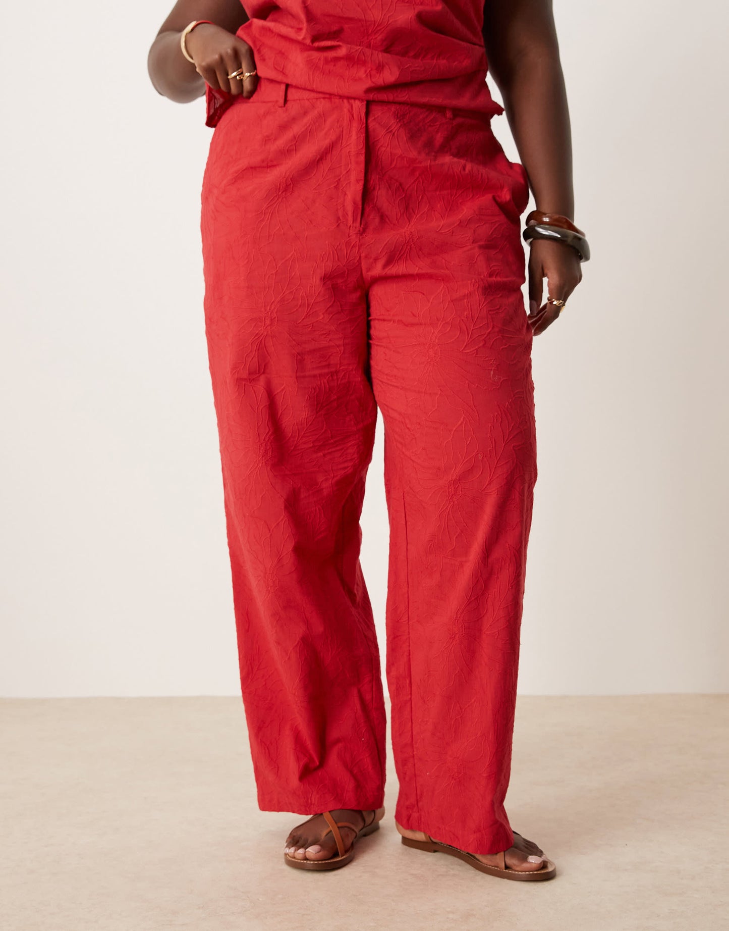 ASOS DESIGN Curve tailored flower textured relaxed trousers co-ord in red