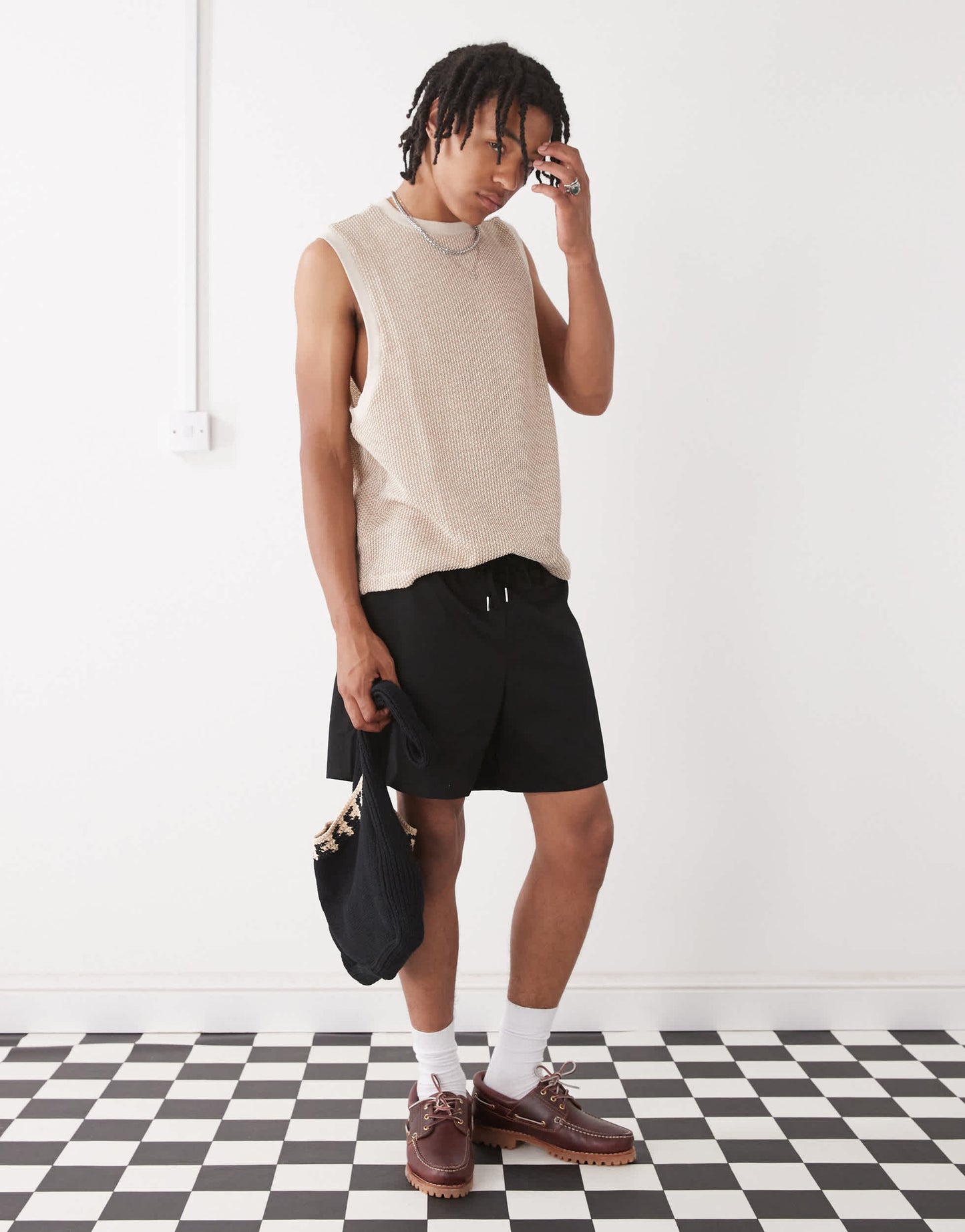Reclaimed Vintage baggy fit shorter length pull on chino short in black