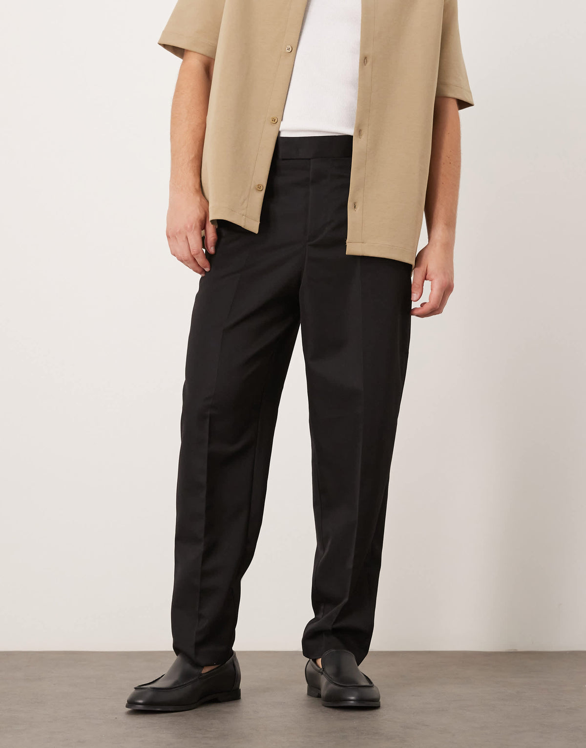 ASOS DESIGN smart relaxed tapered fit trousers in black