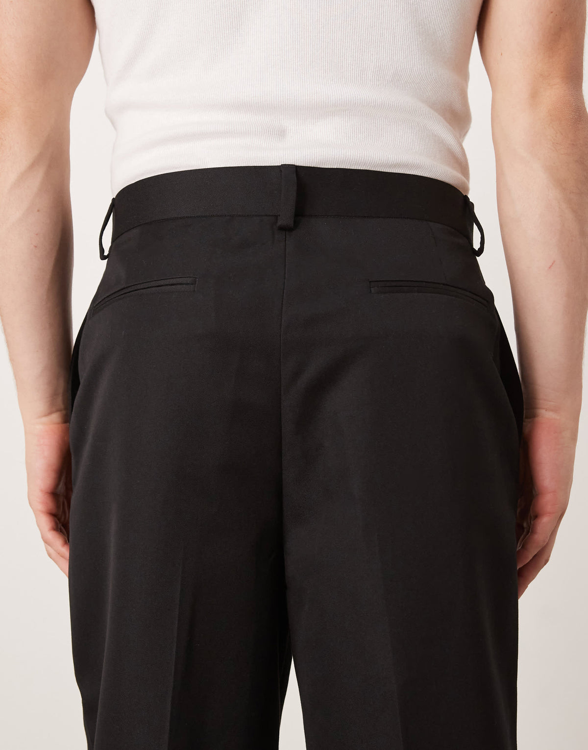 ASOS DESIGN smart relaxed tapered fit trousers in black