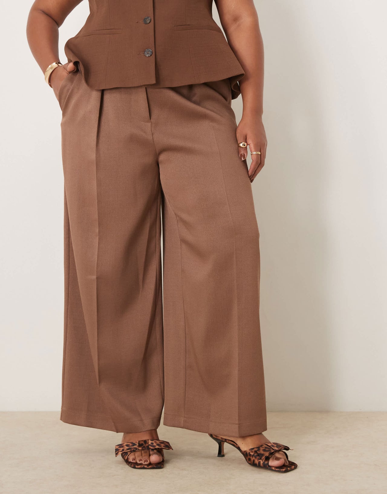 ASOS DESIGN Curve tailored ankle grazer trousers with PU belt in mocha