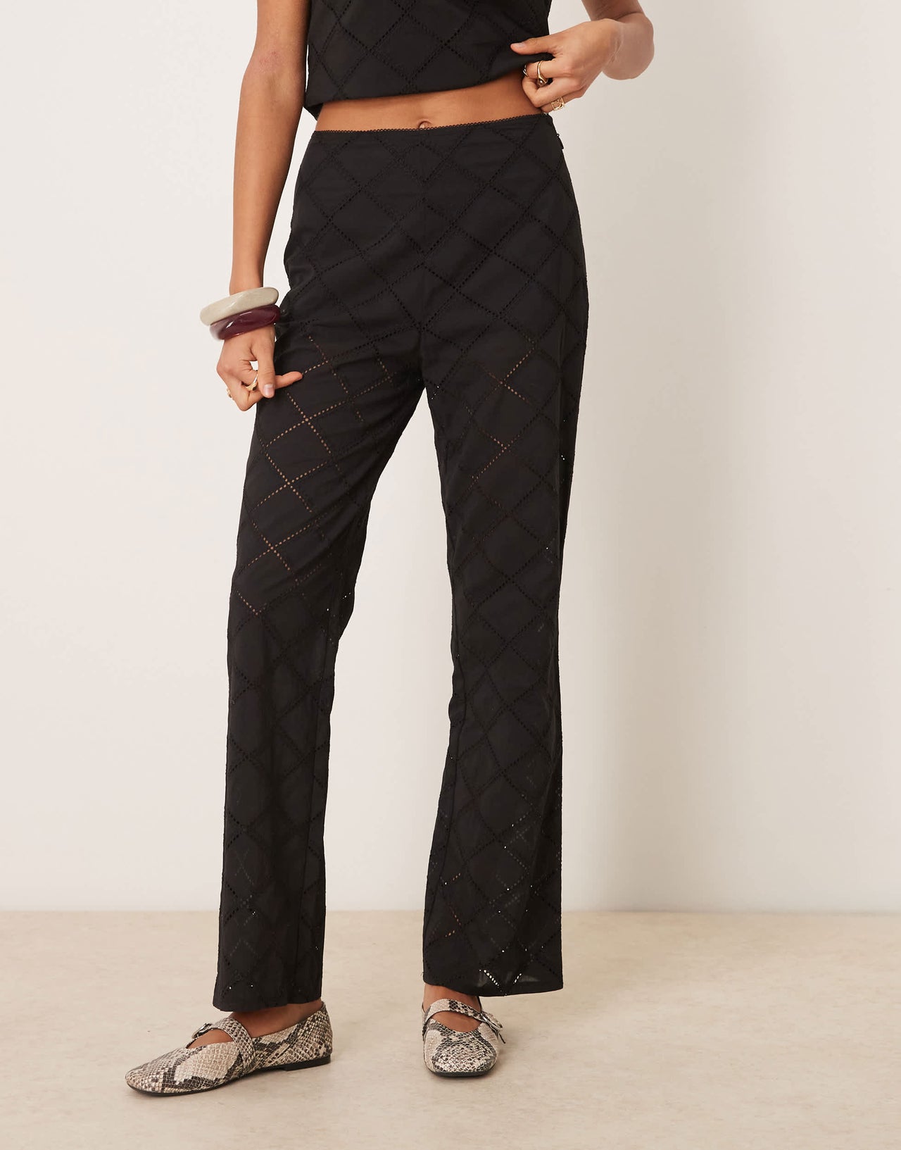ASOS DESIGN straight leg trousers co-ord with geo cutwork in black