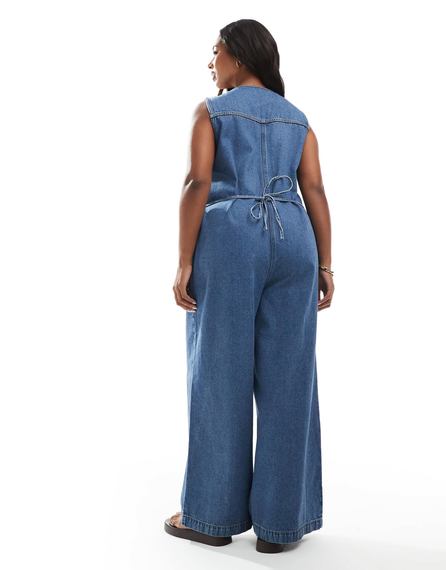 ASOS DESIGN Curve denim sleeveless loose jumpsuit in midwash blue