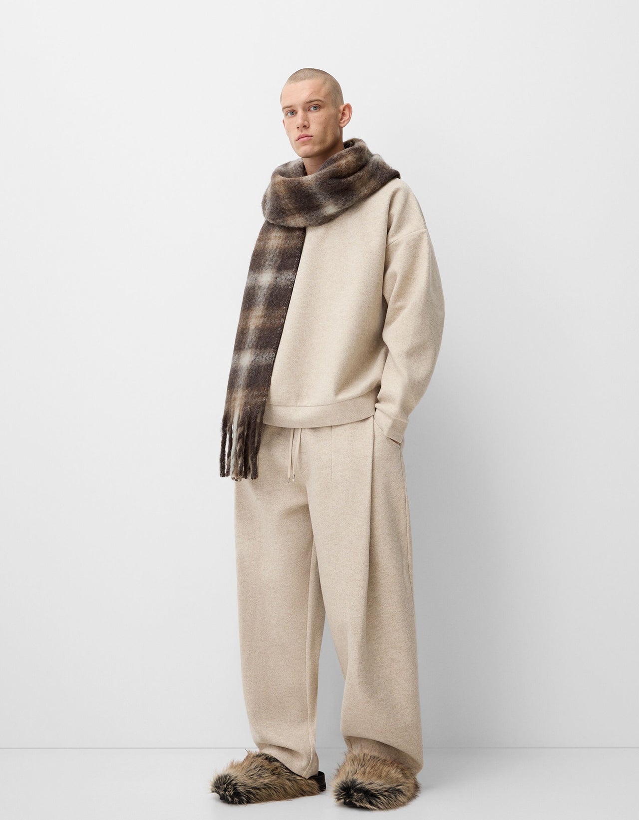 Bershka Collection knitted co-ord polo in sand