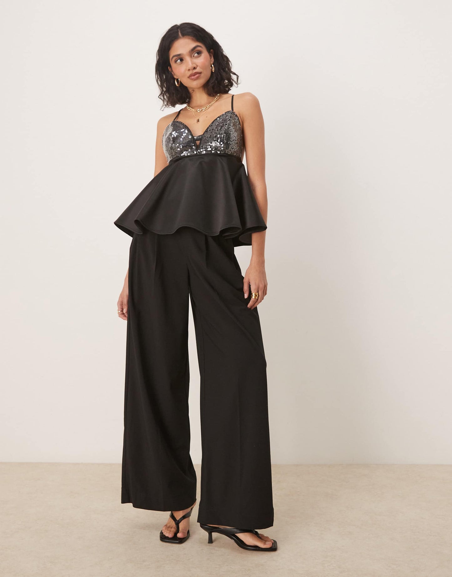 ASOS DESIGN sequin bust with peplum cami top in black