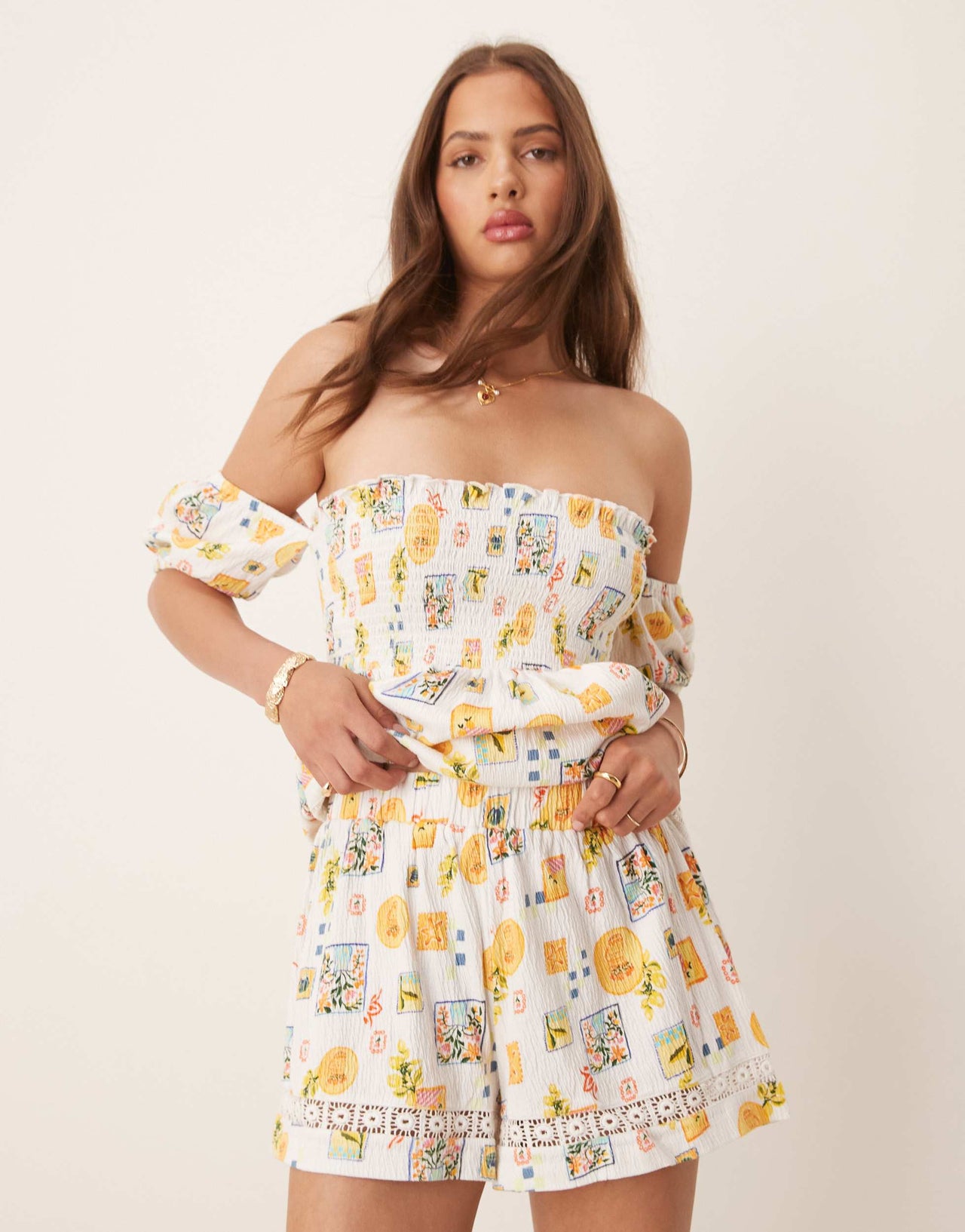 ASOS DESIGN lace trim shorts in postcard print