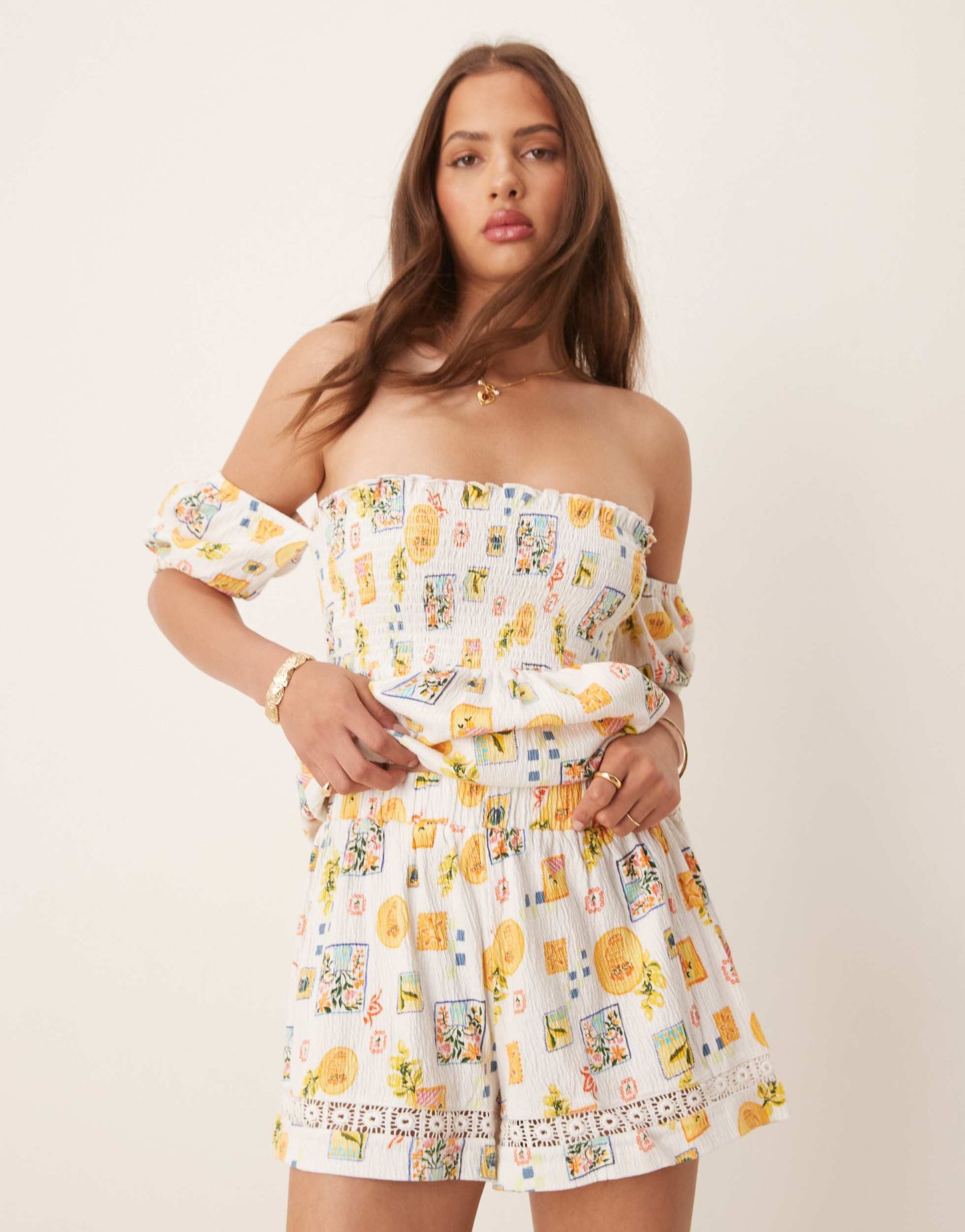 ASOS DESIGN lace trim shorts in postcard print