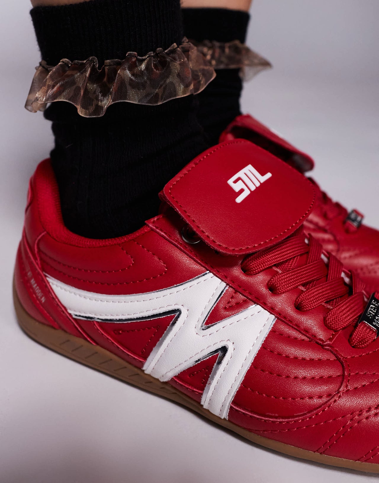 Steve Madden Freekick trainers with fold over detail in red