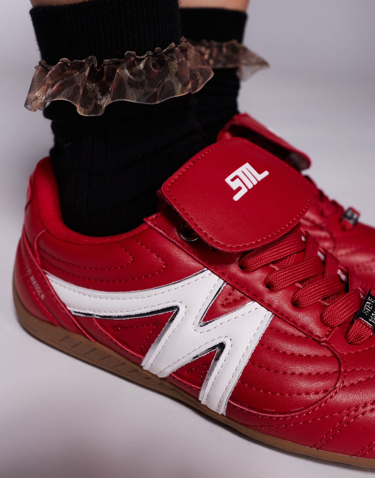 Steve Madden Freekick trainers with fold over detail in red