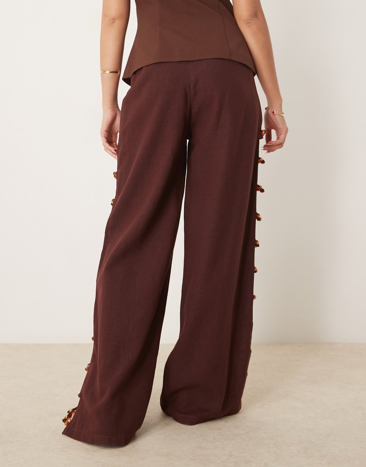 VRG GRL tia linen pants with bead detailing in burgundy