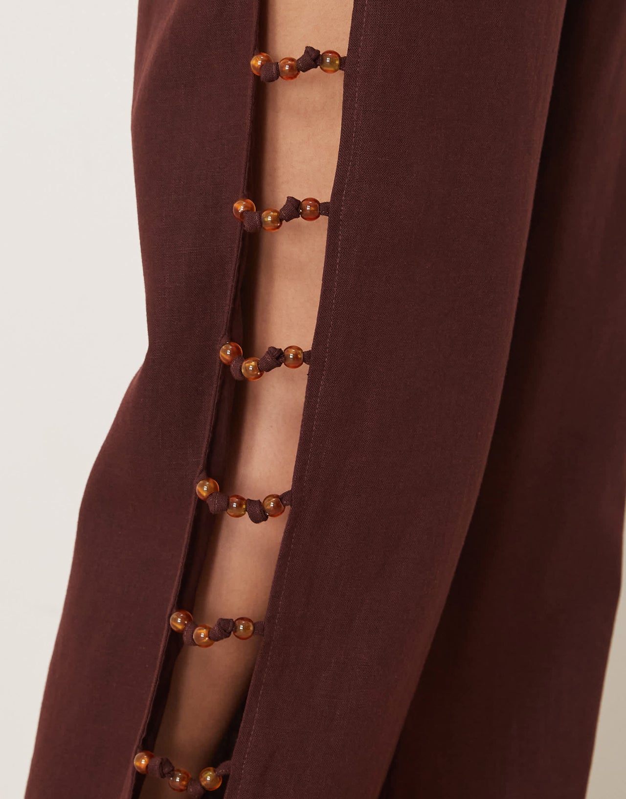VRG GRL tia linen pants with bead detailing in burgundy