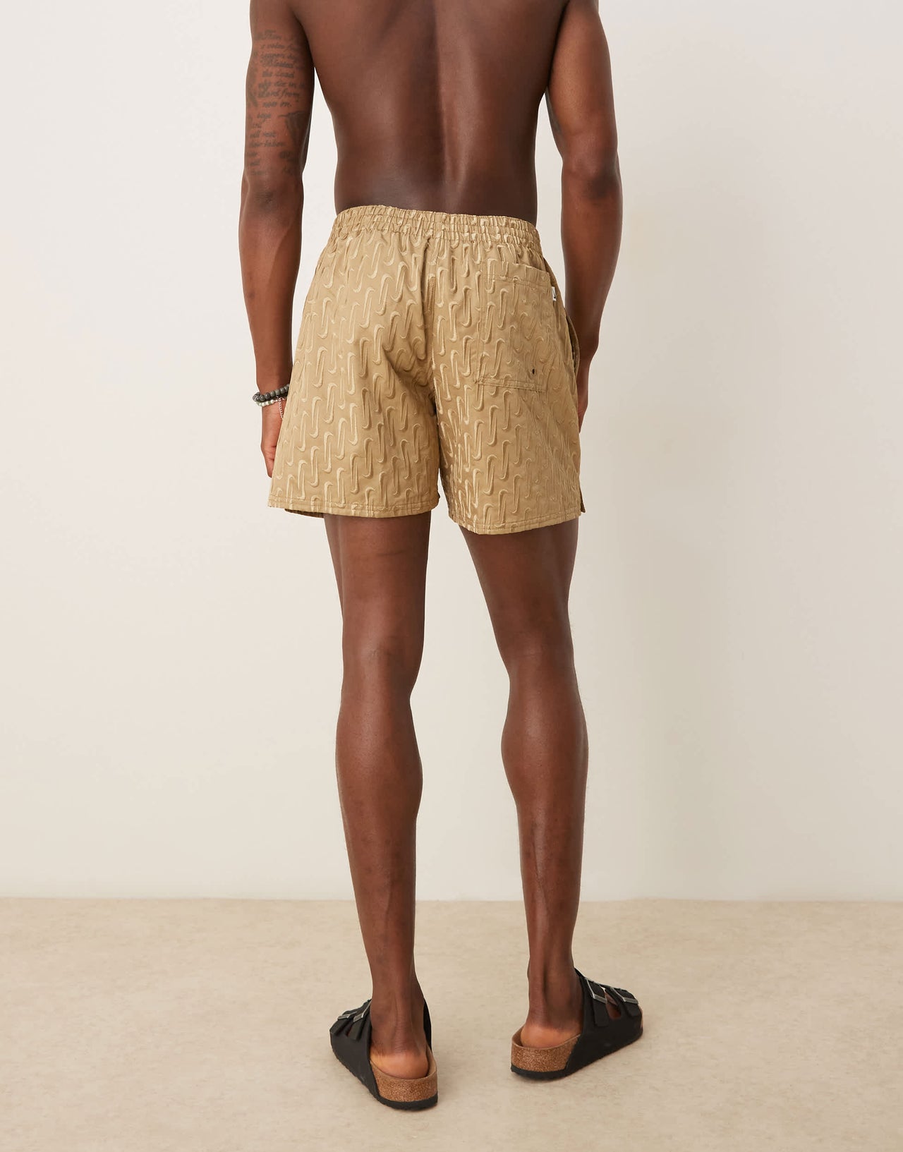 Nike Swoosh Link 5 inch Volley swim shorts in beige