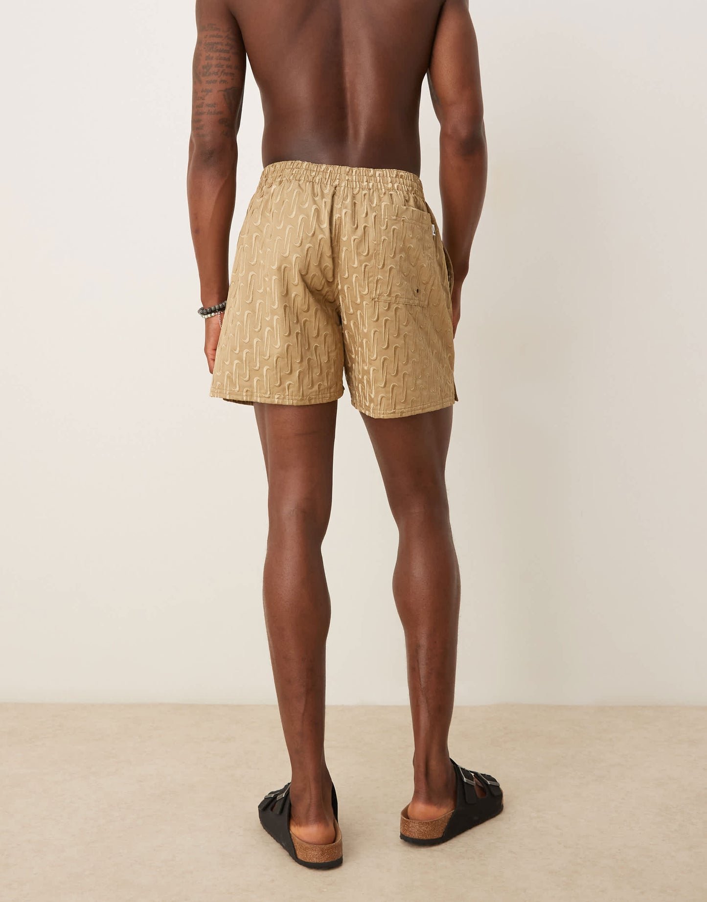 Nike Swoosh Link 5 inch Volley swim shorts in beige