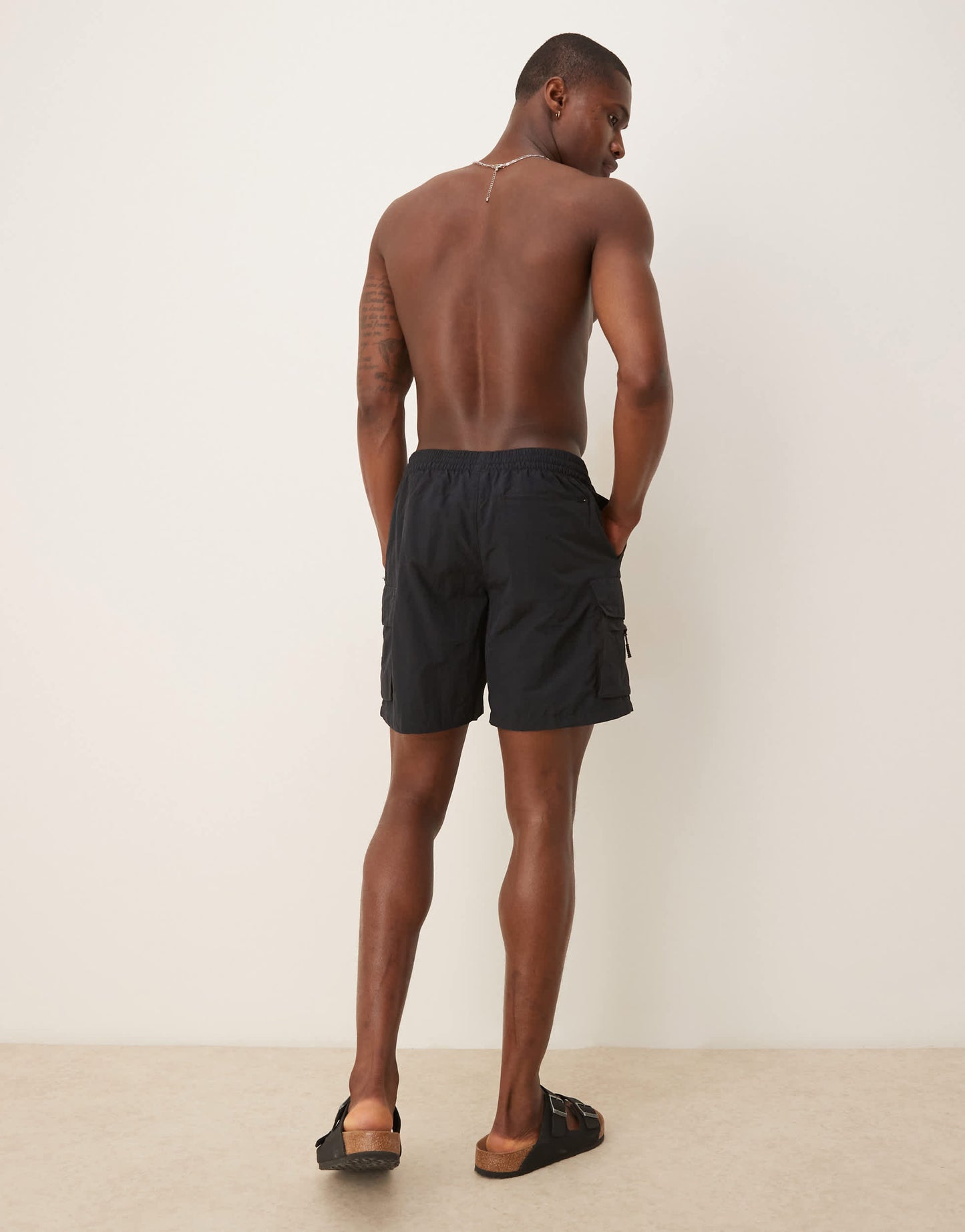 Nike 7 inch Volley multi pocket swim shorts in black