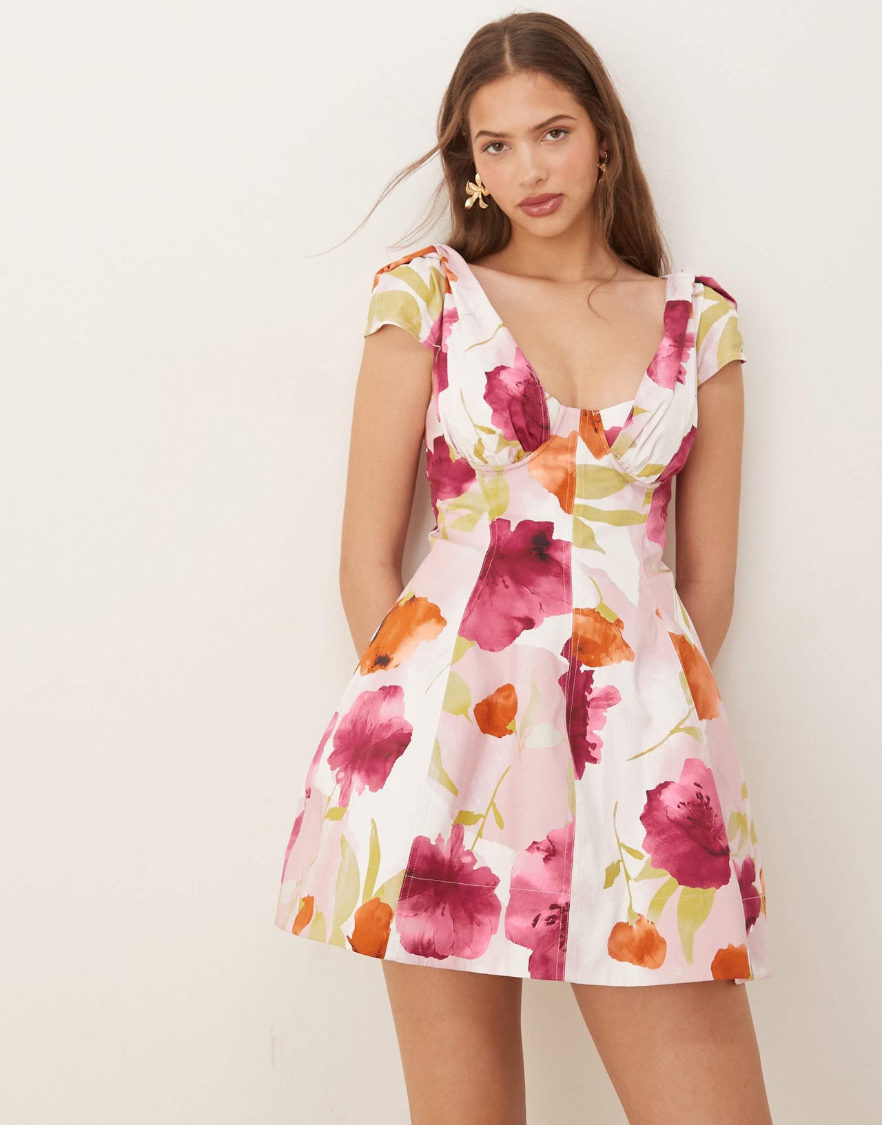 ASOS DESIGN structured bust seam detail cap sleeve mini dress in vibrant abstract print