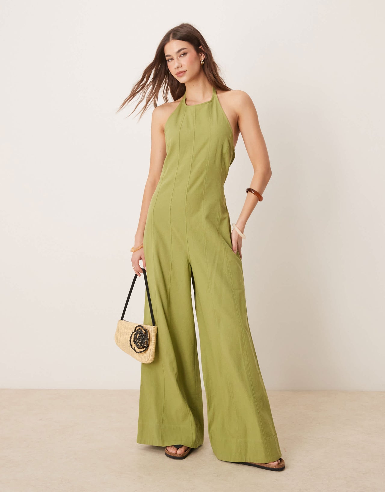 ASOS DESIGN halterneck seamed jumspuit with wide leg in sage