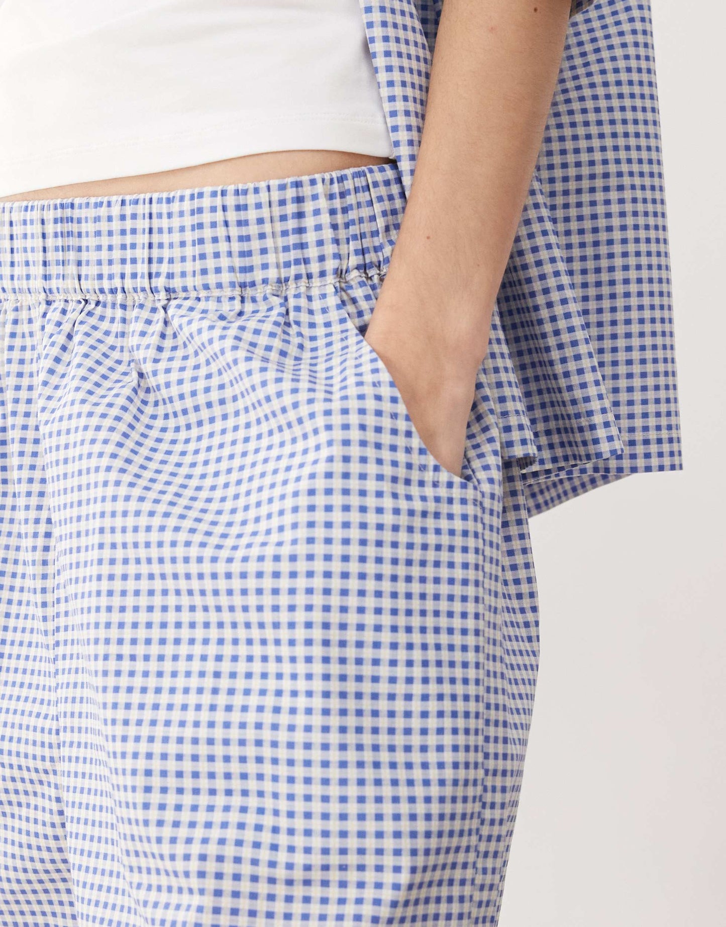 Reclaimed Vintage unisex boxy pull on shorts in blue and white gingham