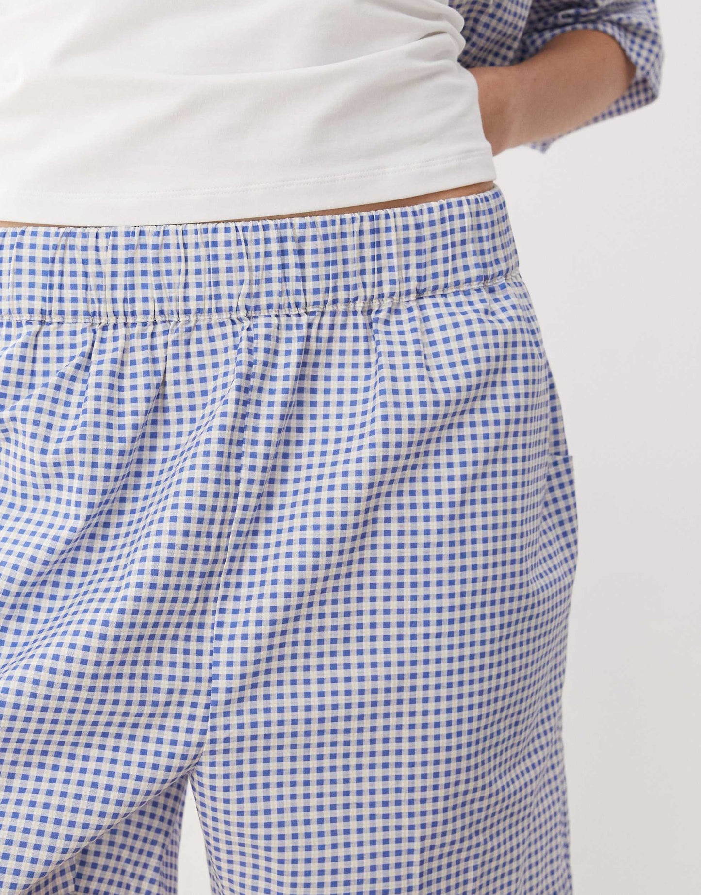 Reclaimed Vintage unisex boxy pull on shorts in blue and white gingham