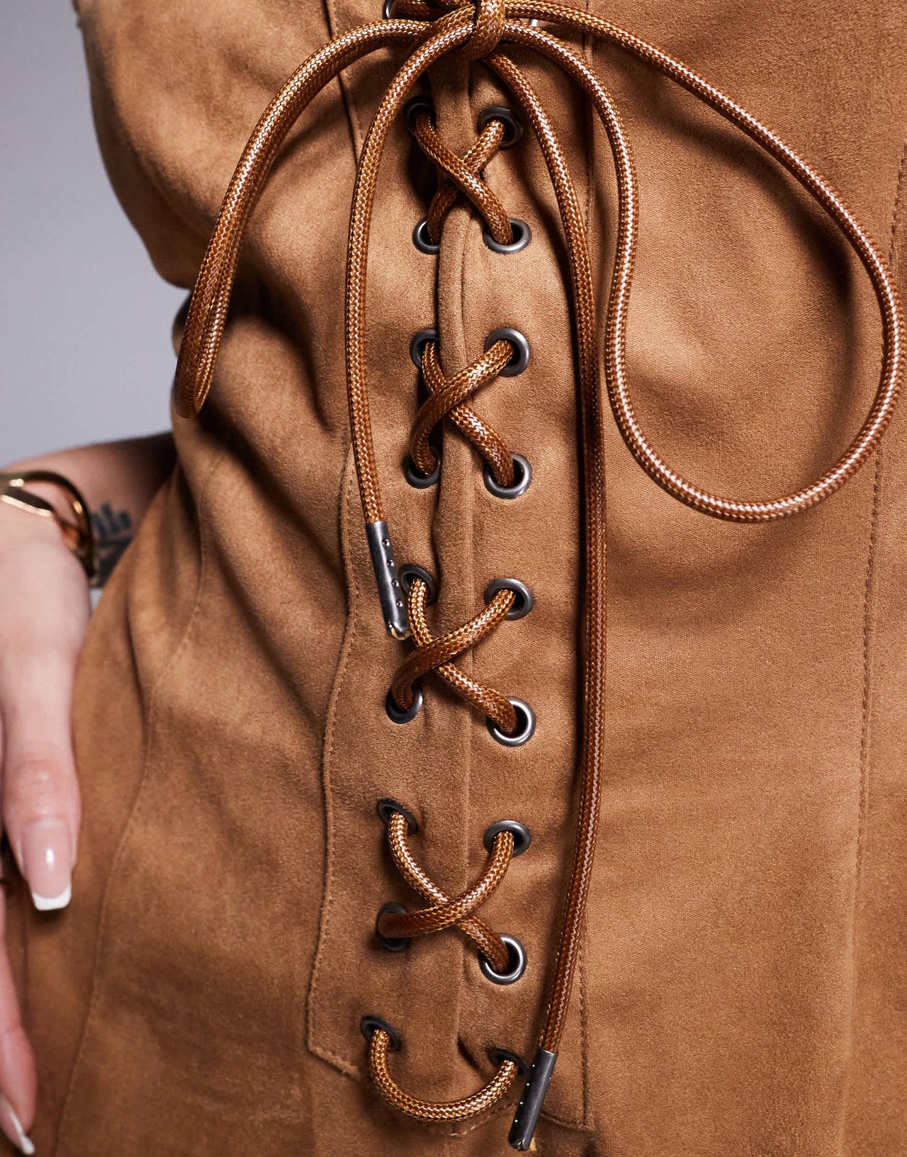 ASOS DESIGN suedette lace up playsuit with stud detail in tan